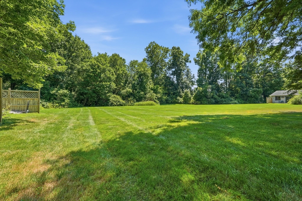 170 East Hadley Road, Unit 96 Amherst, MA 01002 - Photo 32 of 36 a view of a park with a trees in the background
