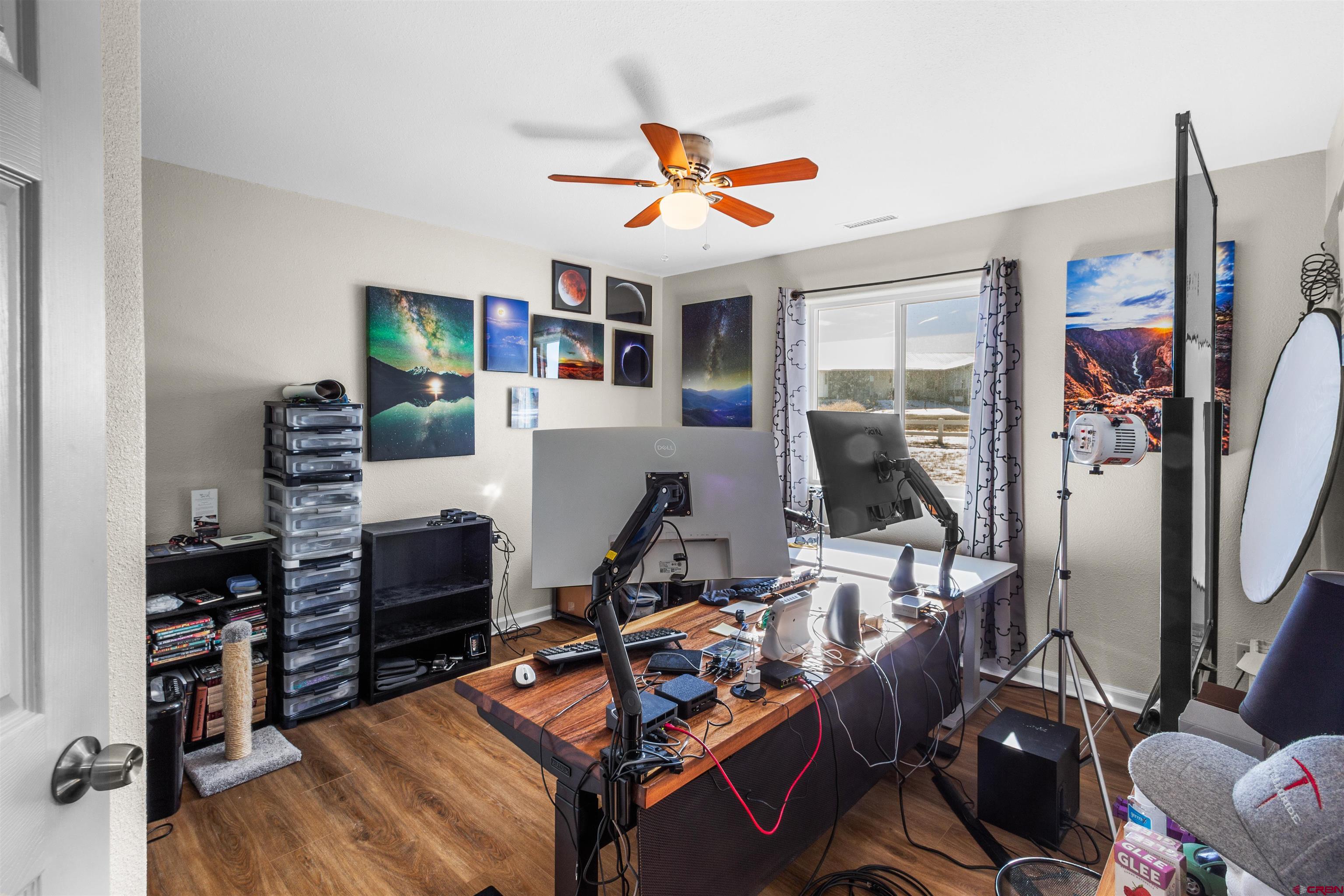 62920 Jeremy Road Montrose, CO 81401 - Photo 19 of 31 a room with furniture and gym equipment