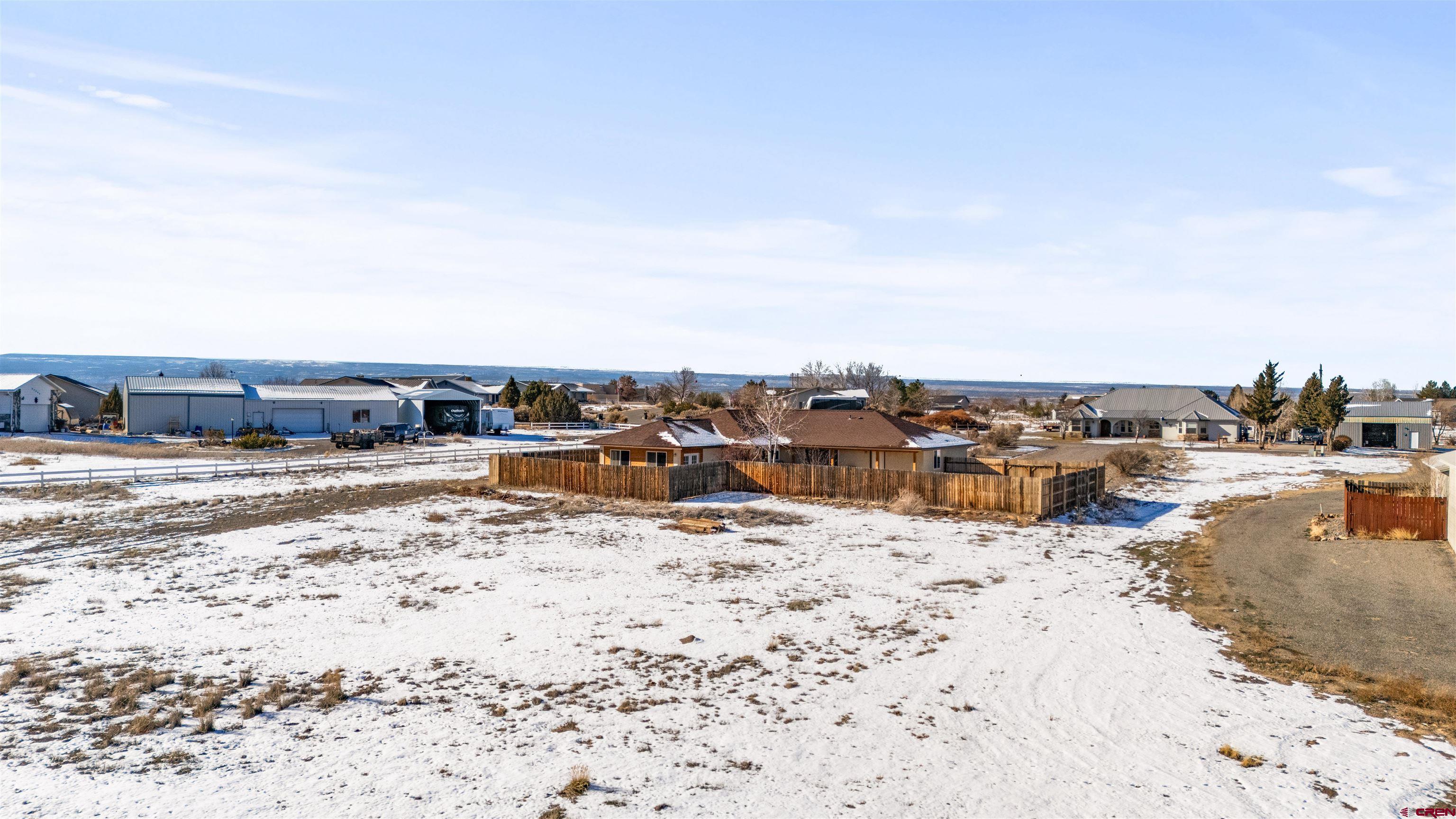 62920 Jeremy Road Montrose, CO 81401 - Photo 27 of 31 a view of a ocean with beach