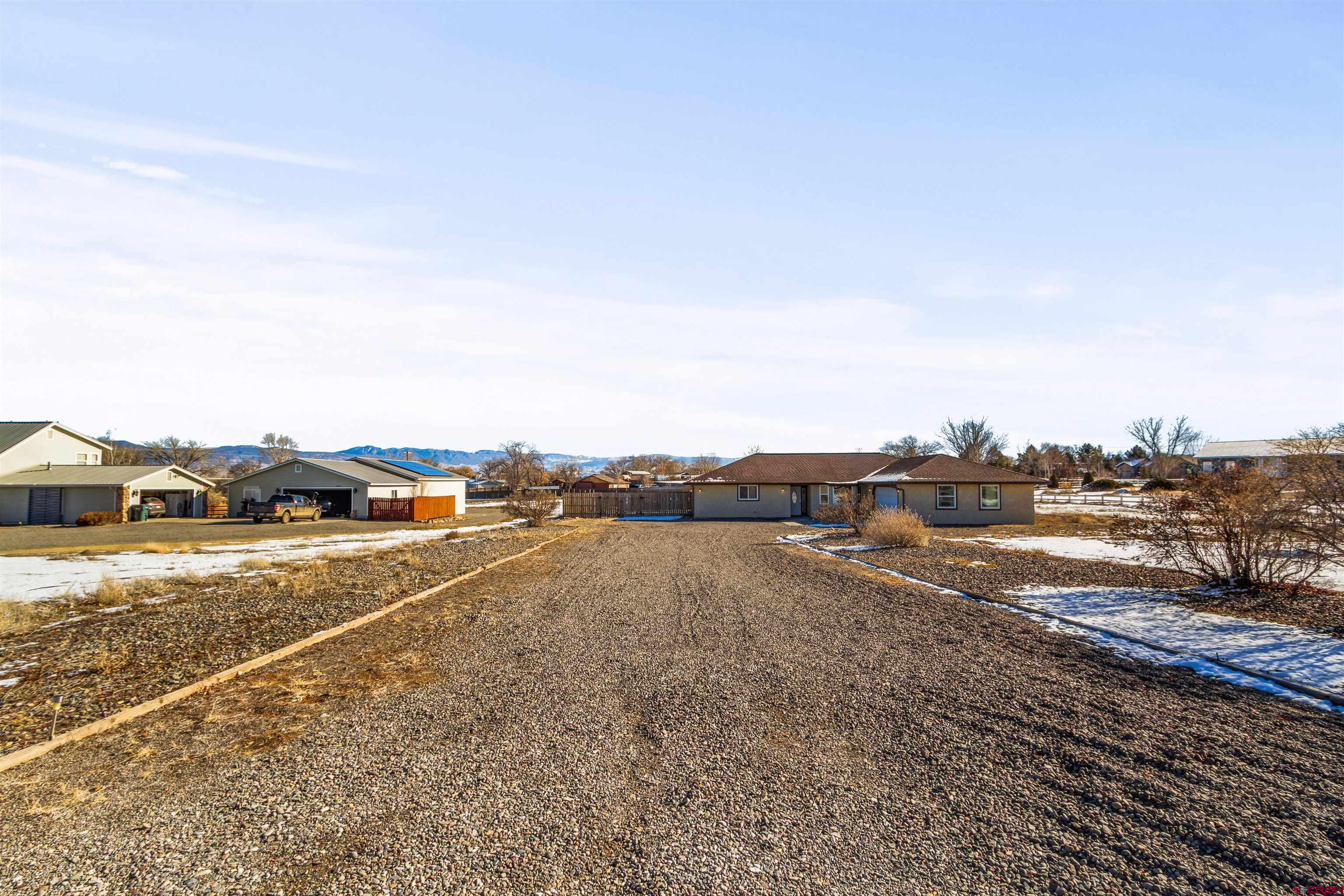 62920 Jeremy Road Montrose, CO 81401 - Photo 29 of 31 a view of an ocean and beach
