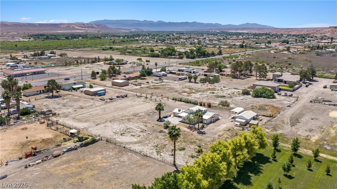 750 Leming Avenue Overton, NV 89040 - Photo 76 of 82 This expansive aerial view showcases a vibrant community nestled in a picturesque desert landscape.