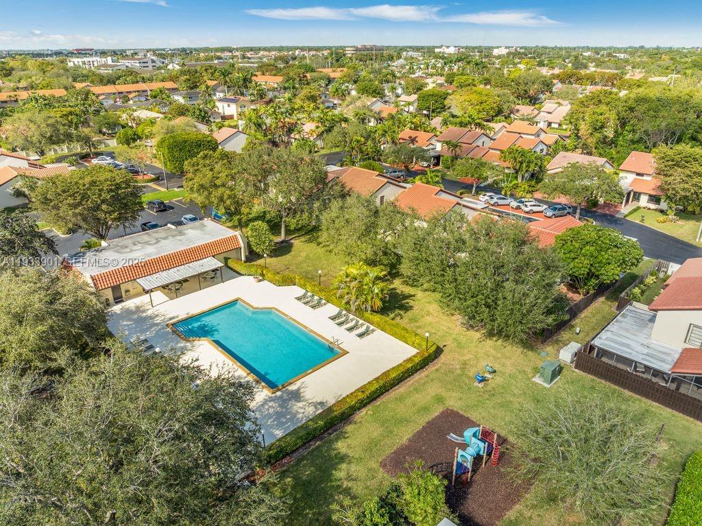 11256 Southwest 90th Lane, Unit 11256 Miami, FL 33176 - Photo 28 of 36 an aerial view of residential houses with outdoor space