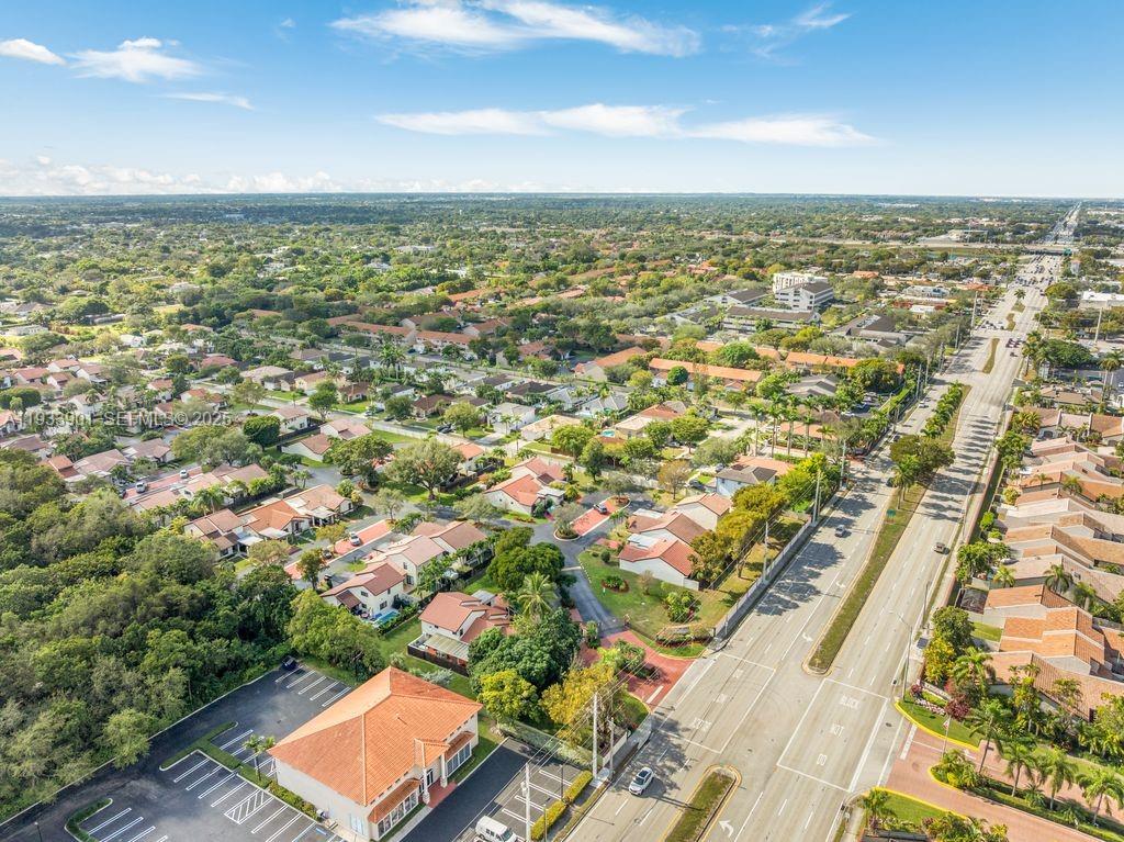 11256 Southwest 90th Lane, Unit 11256 Miami, FL 33176 - Photo 33 of 36 an aerial view of residential building with parking space