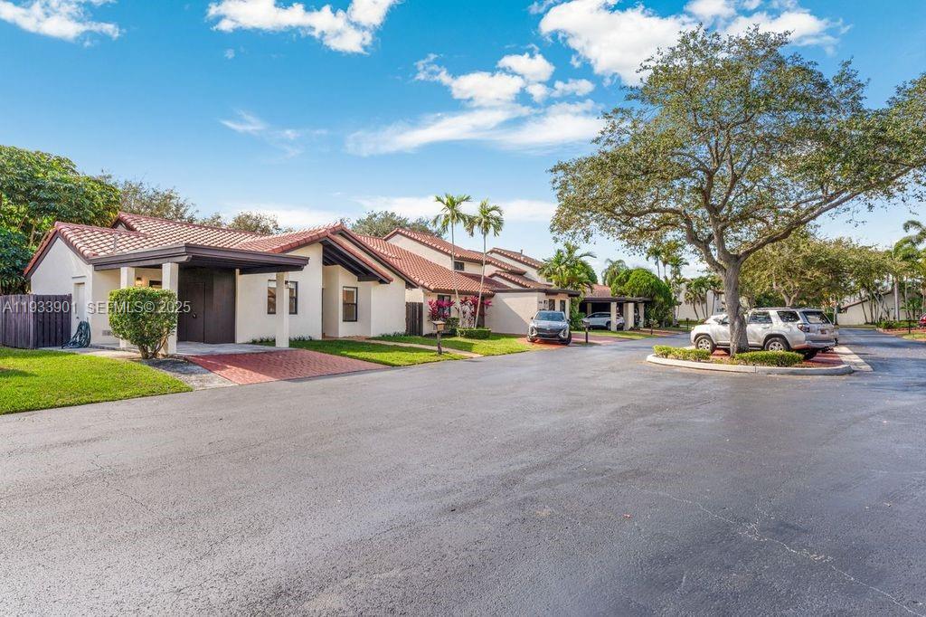 11256 Southwest 90th Lane, Unit 11256 Miami, FL 33176 - Photo 36 of 36 a view of outdoor space with yard and green space