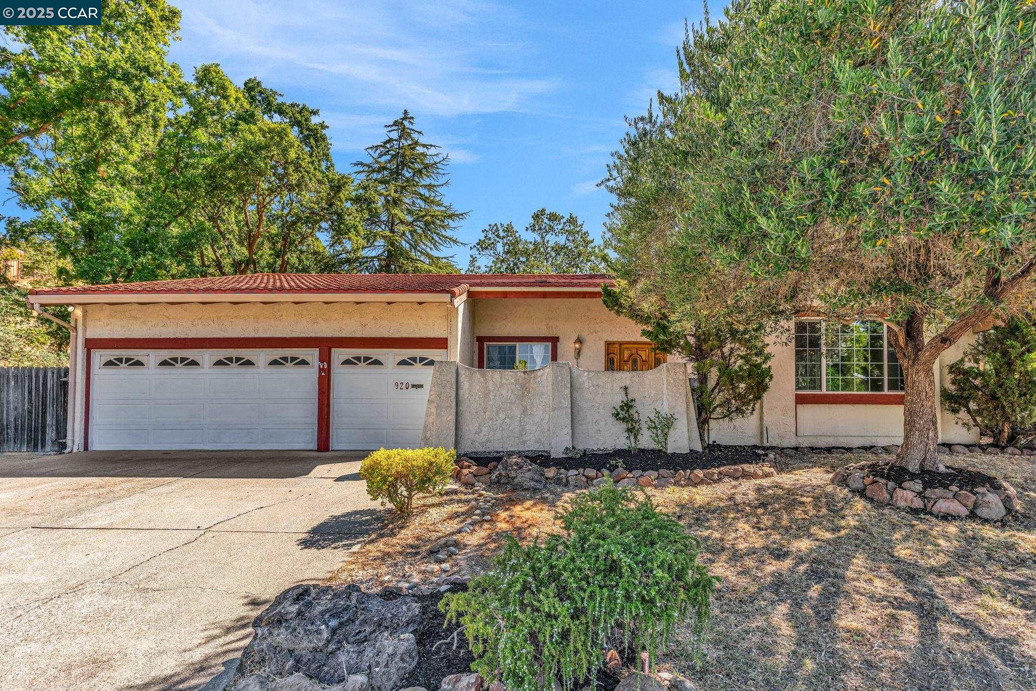 a house view with a outdoor space