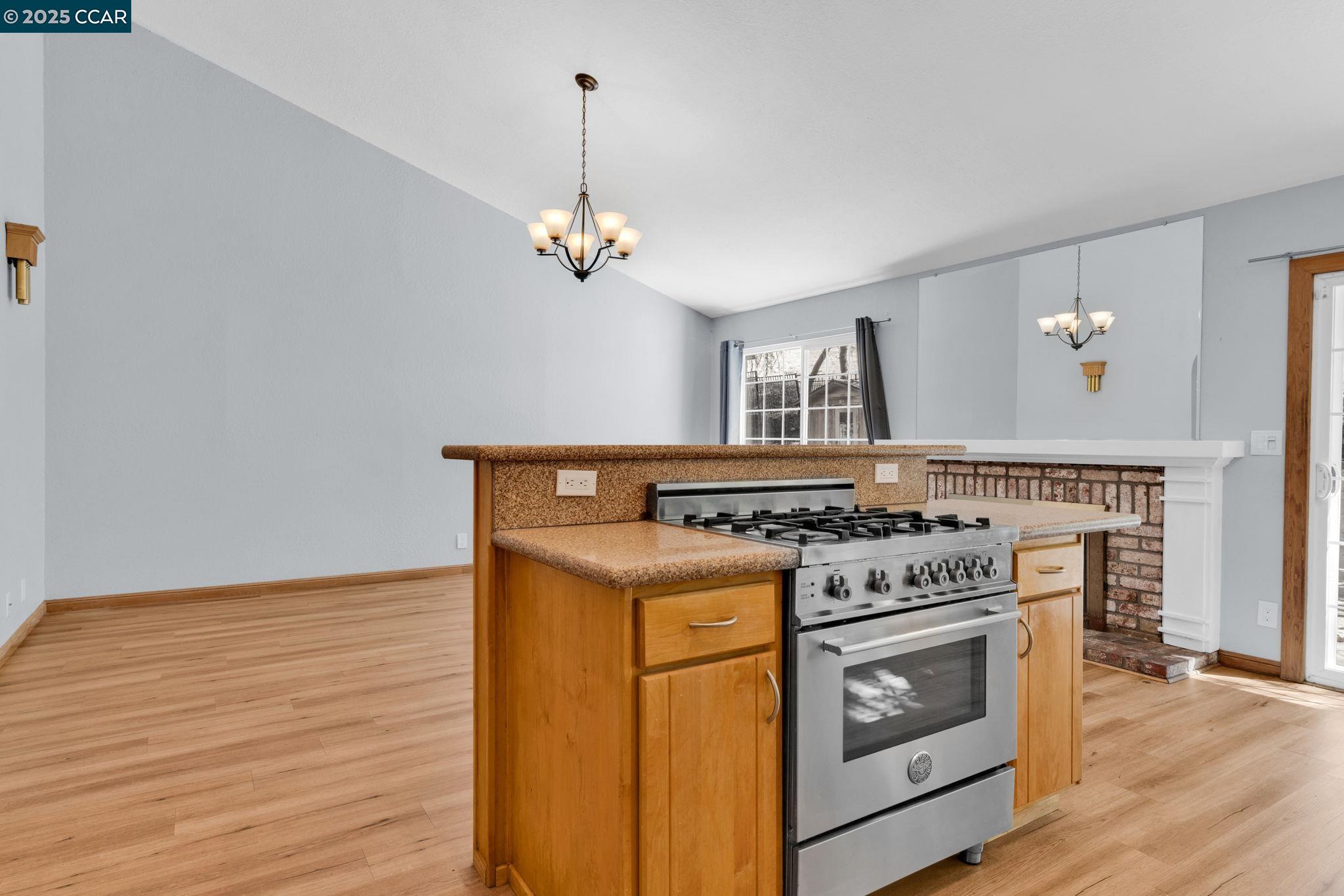 920 Palmer Road Walnut Creek, CA 94596 - Photo 14 of 47 a stove top oven sitting inside of a kitchen