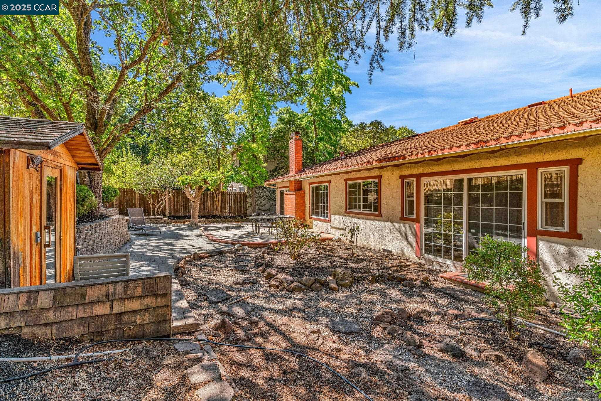 920 Palmer Road Walnut Creek, CA 94596 - Photo 15 of 47 a view of a house with a yard