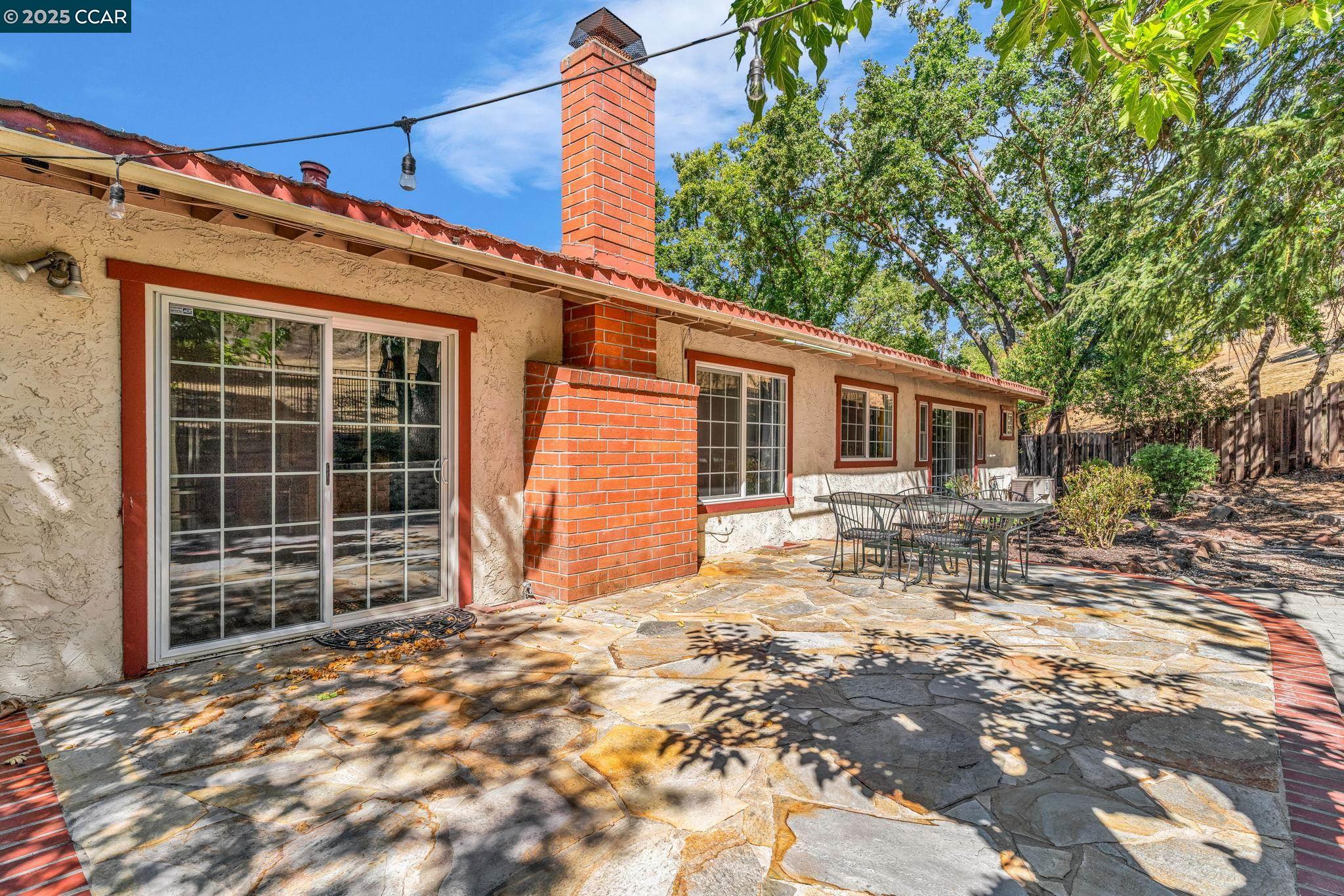 920 Palmer Road Walnut Creek, CA 94596 - Photo 22 of 47 a view of a house with a yard