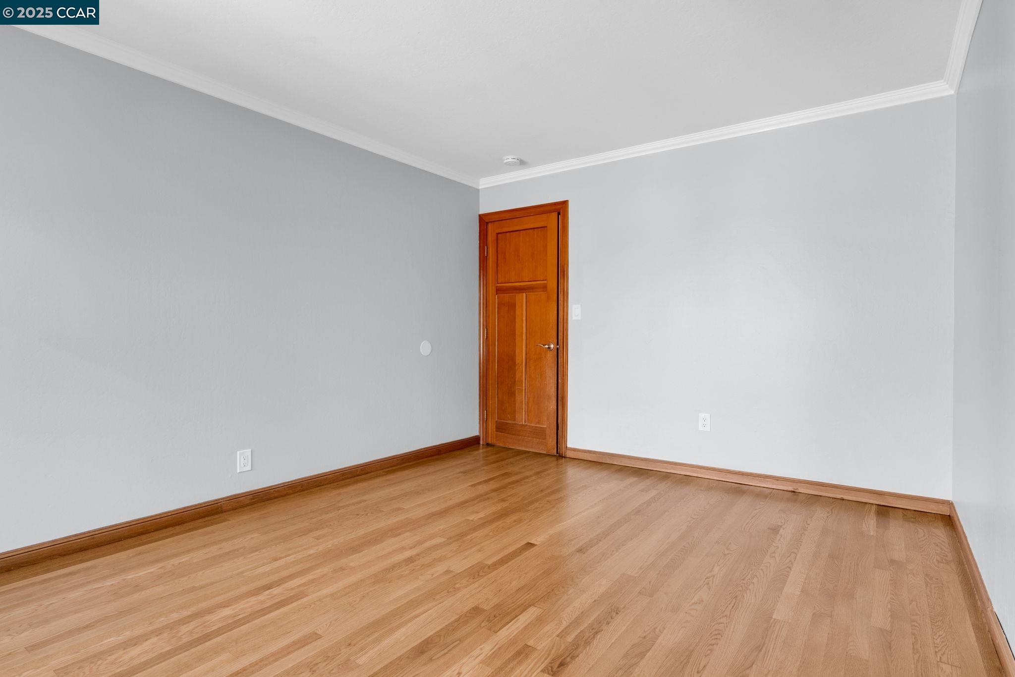 920 Palmer Road Walnut Creek, CA 94596 - Photo 33 of 47 a view of an empty room with wooden floor