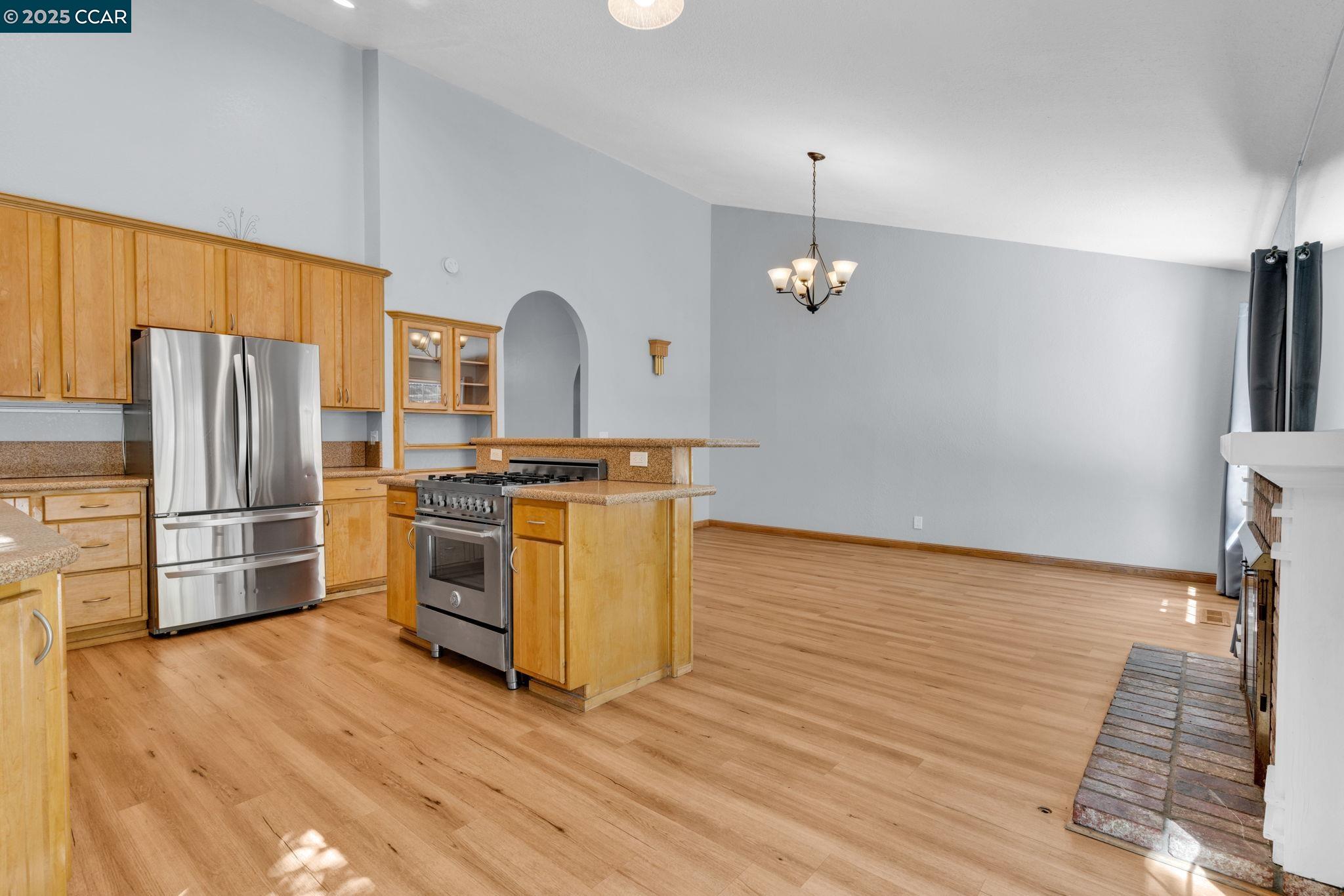 920 Palmer Road Walnut Creek, CA 94596 - Photo 36 of 47 a kitchen with stainless steel appliances a refrigerator and a stove top oven