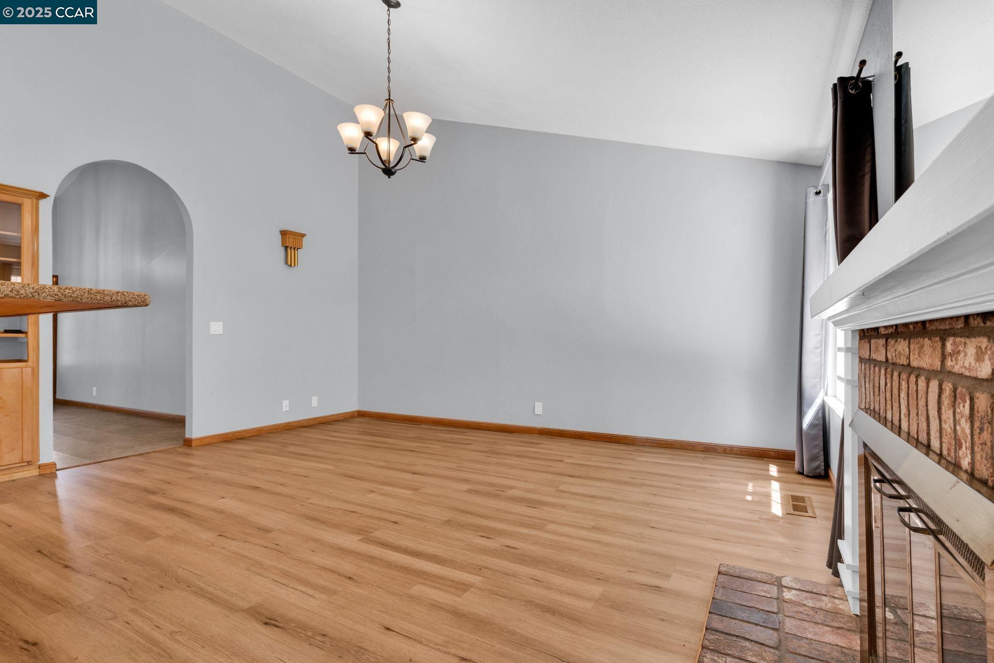 920 Palmer Road Walnut Creek, CA 94596 - Photo 37 of 47 a view of empty room with wooden floor and fan