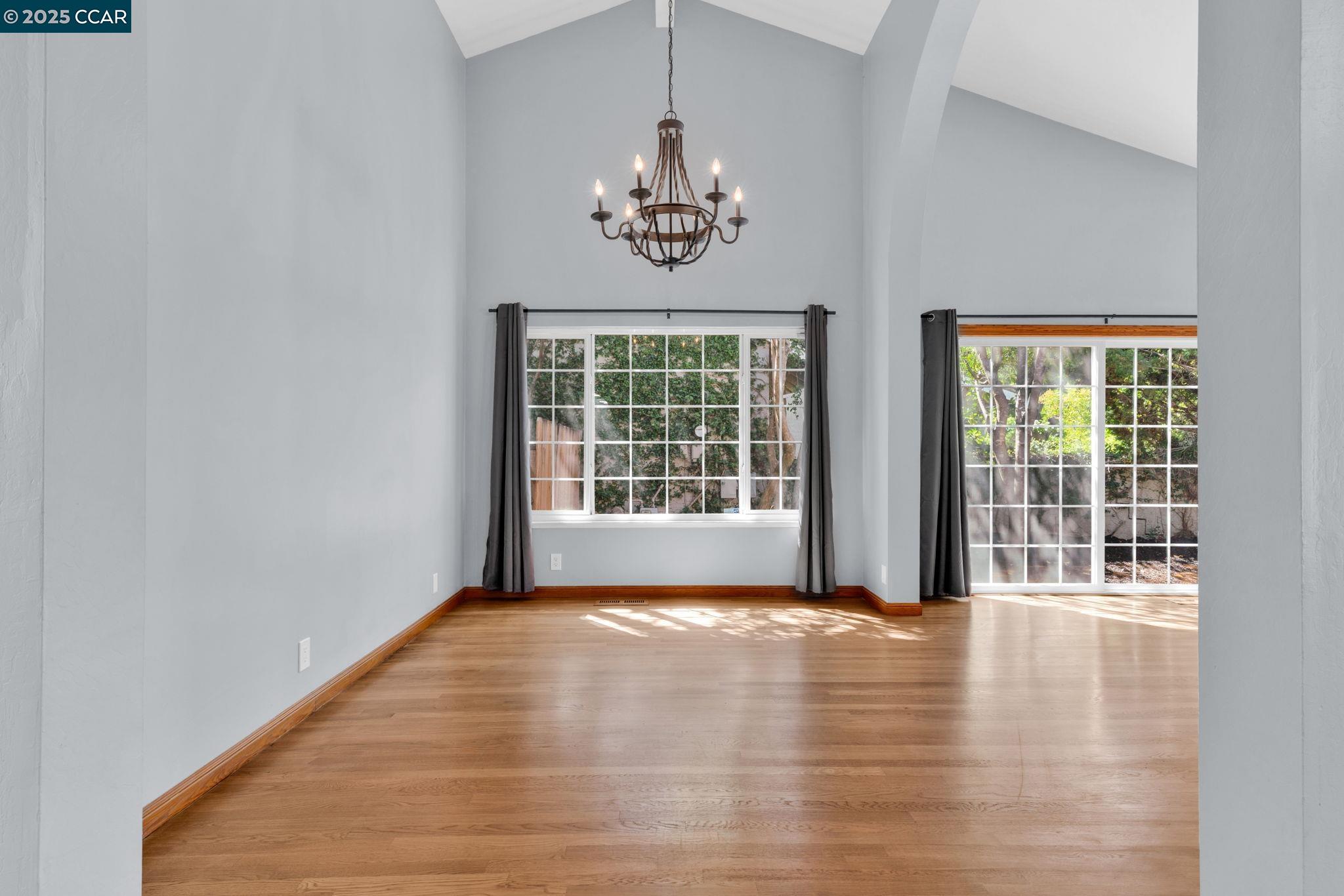 920 Palmer Road Walnut Creek, CA 94596 - Photo 38 of 47 a view of an empty room with wooden floor and a window