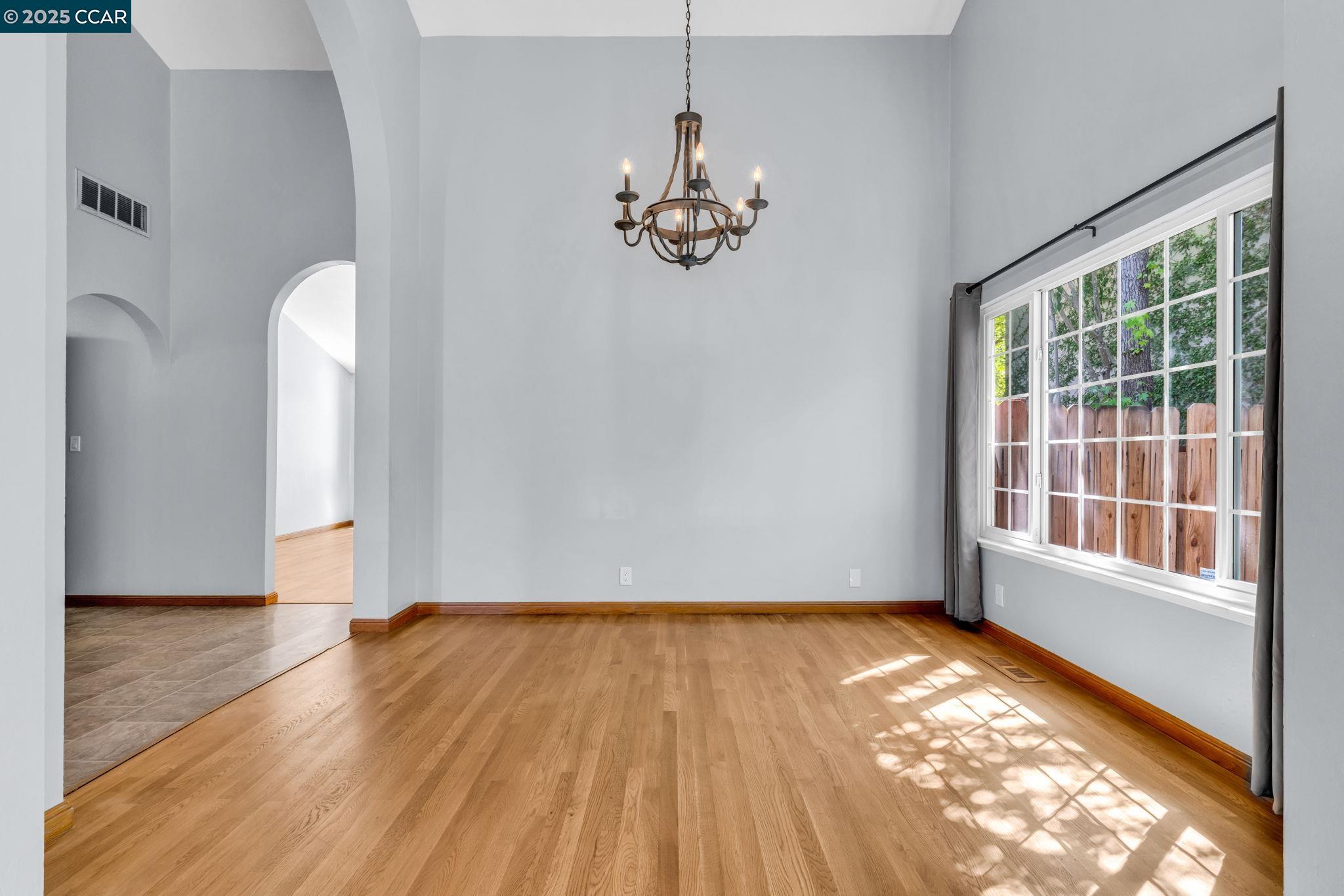 920 Palmer Road Walnut Creek, CA 94596 - Photo 45 of 47 a view of empty room with wooden floor and fan