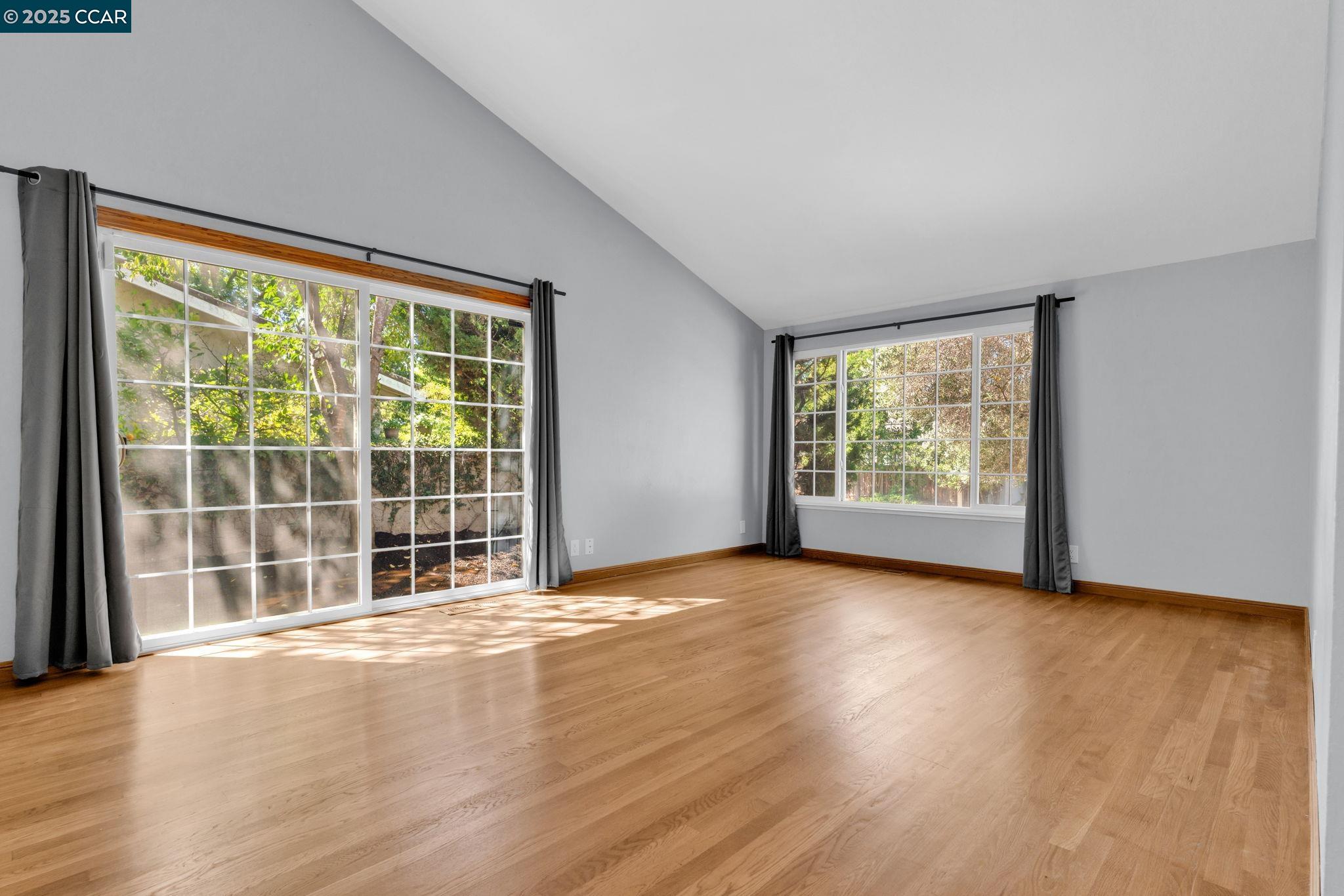 920 Palmer Road Walnut Creek, CA 94596 - Photo 47 of 47 a view of an empty room with wooden floor and a window