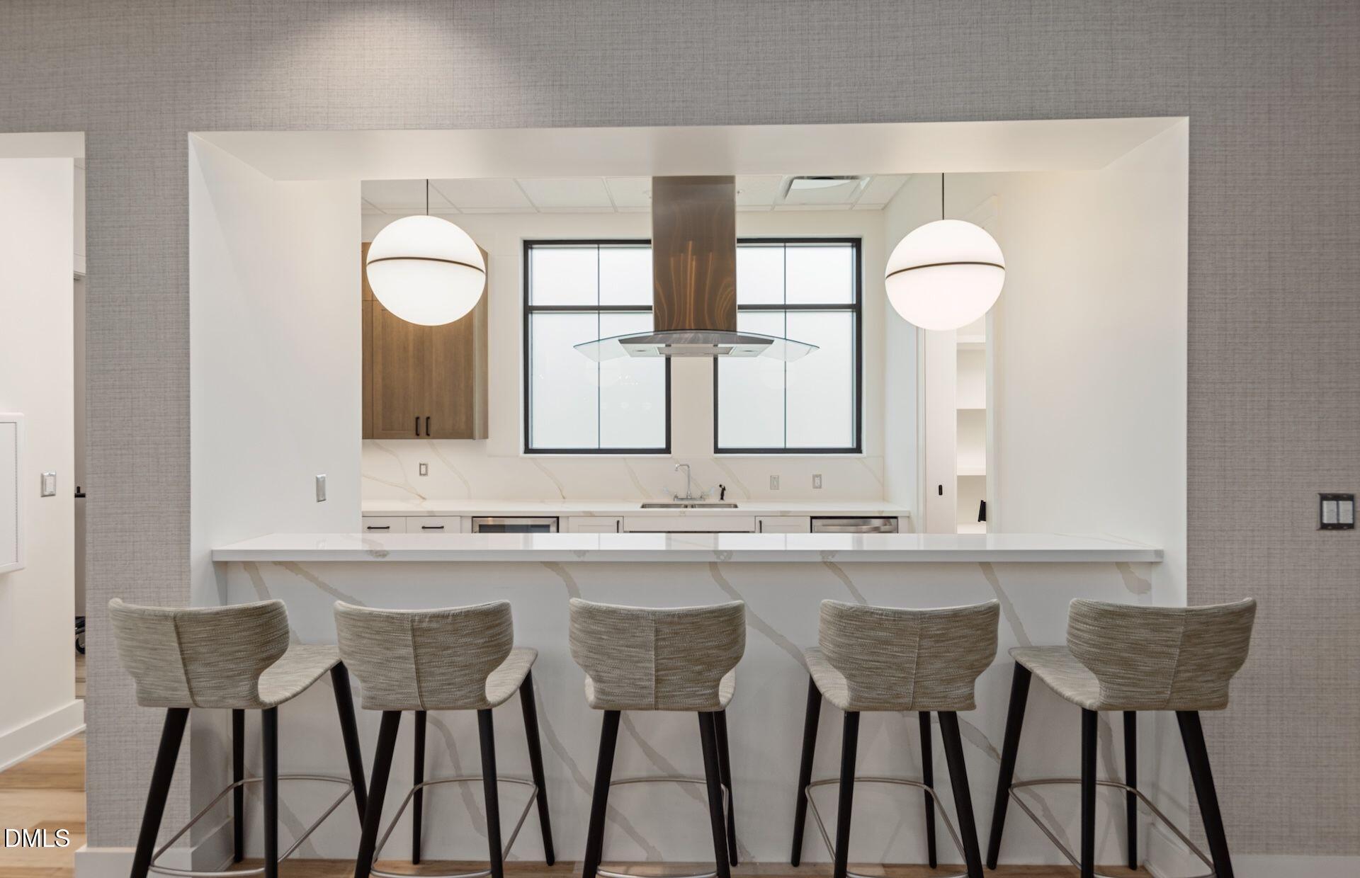35 Rockingham Way Clayton, NC 27520 - Photo 31 of 42 a view of a dining room and chairs