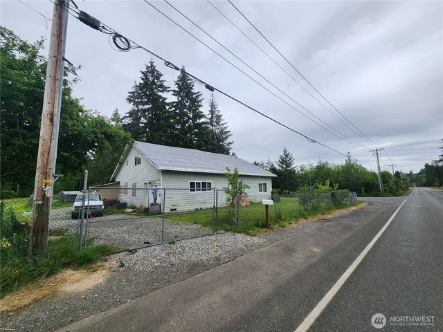 a view of a house with a street