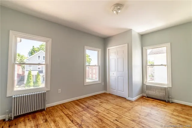 an empty room with windows