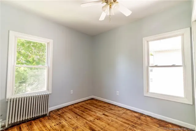 a view of an empty room and window