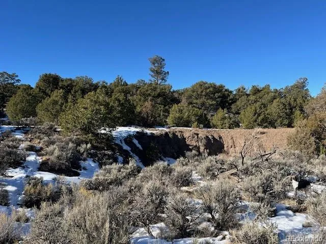 a view of a covered with snow in the background