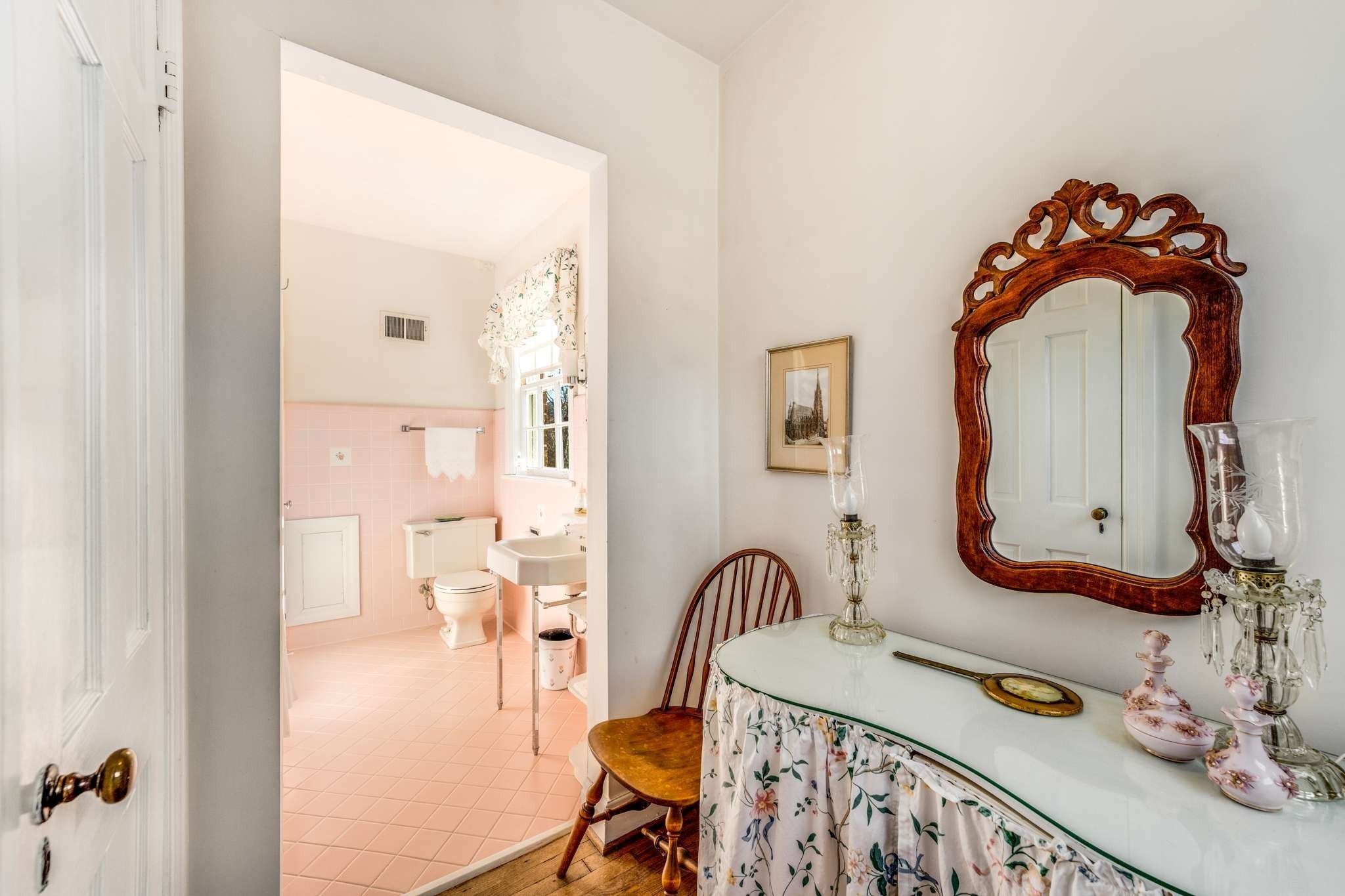 2429 Bear Road Nashville, TN 37215 - Photo 15 of 22 a bathroom with a sink mirror and vanity