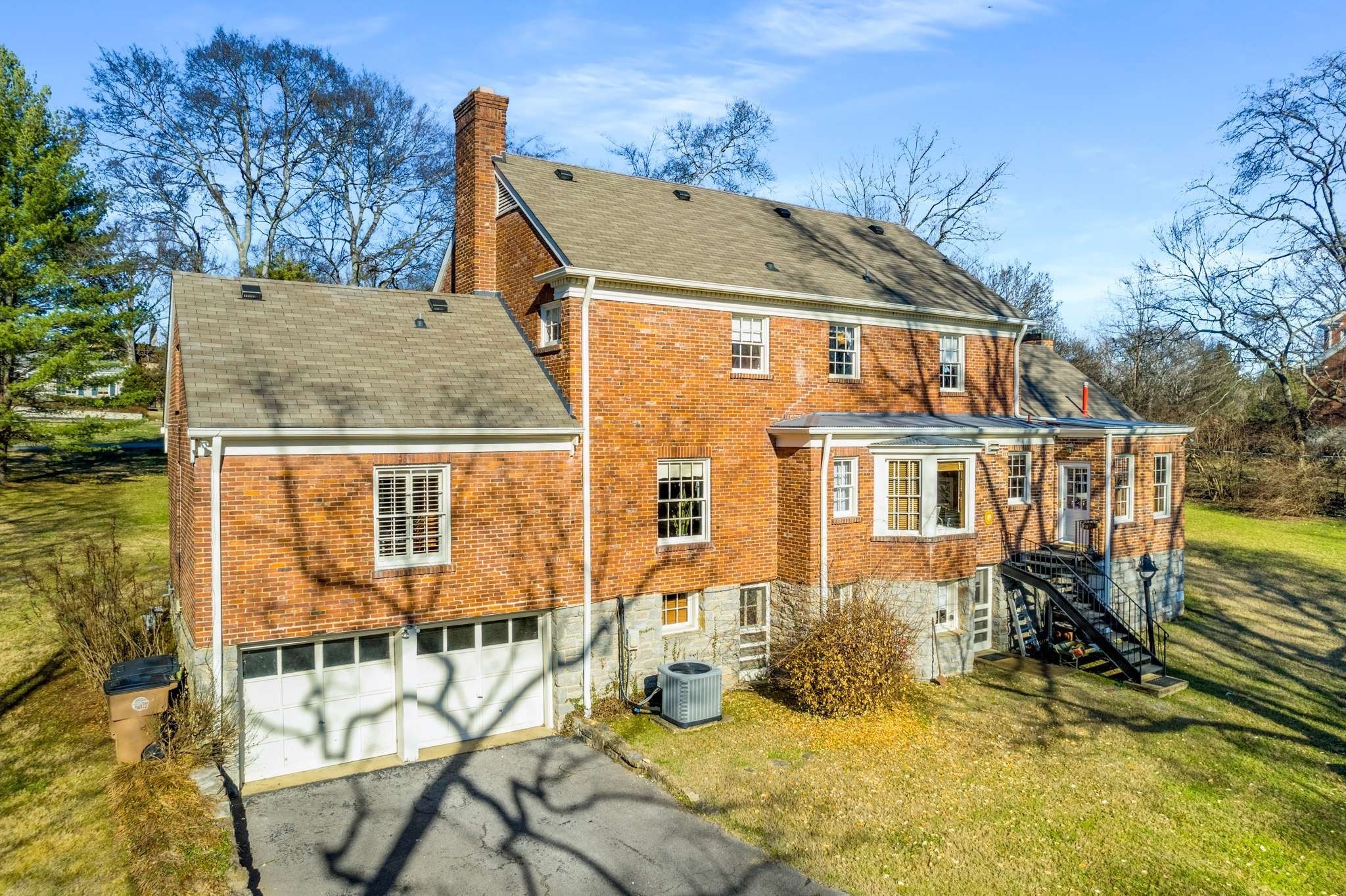 2429 Bear Road Nashville, TN 37215 - Photo 22 of 22 a view of a house with backyard and sitting area