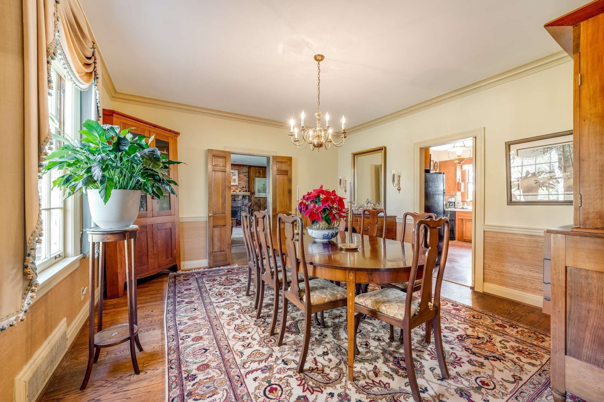 2429 Bear Road Nashville, TN 37215 - Photo 4 of 22 a view of a dining room with furniture and a chandelier