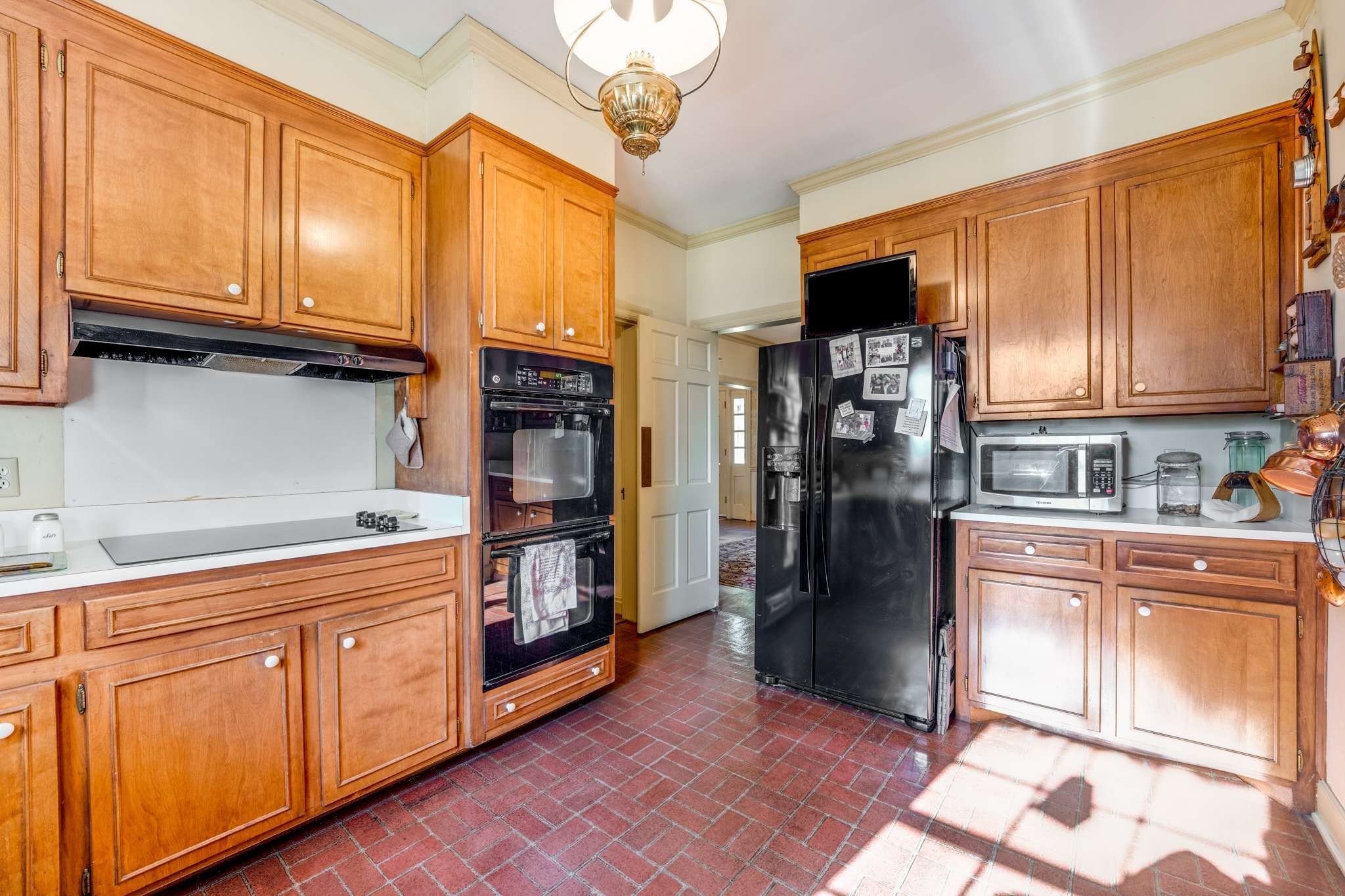 2429 Bear Road Nashville, TN 37215 - Photo 8 of 22 a kitchen with stainless steel appliances granite countertop a refrigerator and cabinets