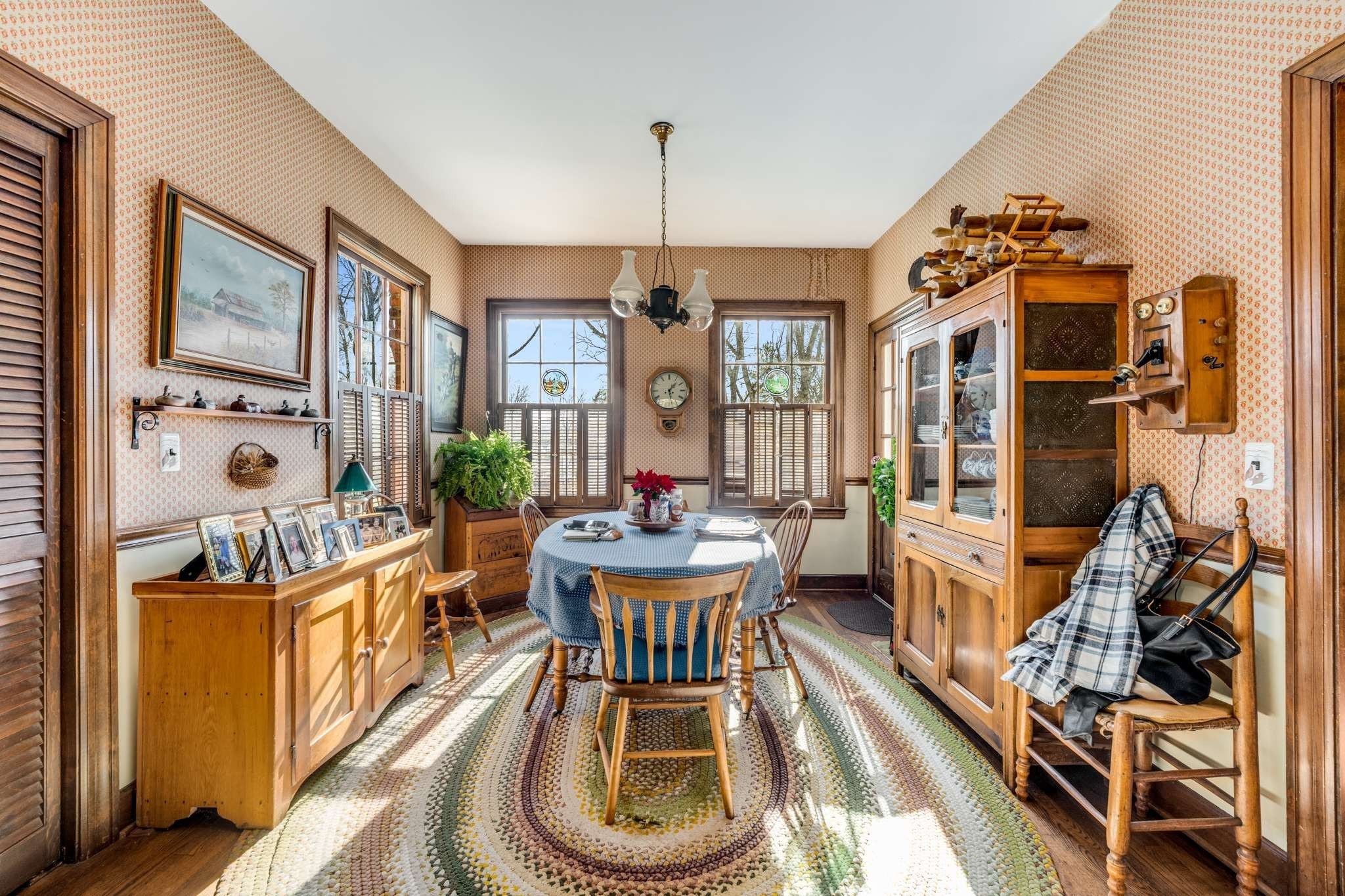 2429 Bear Road Nashville, TN 37215 - Photo 9 of 22 a dining room with furniture a chandelier and wooden floor