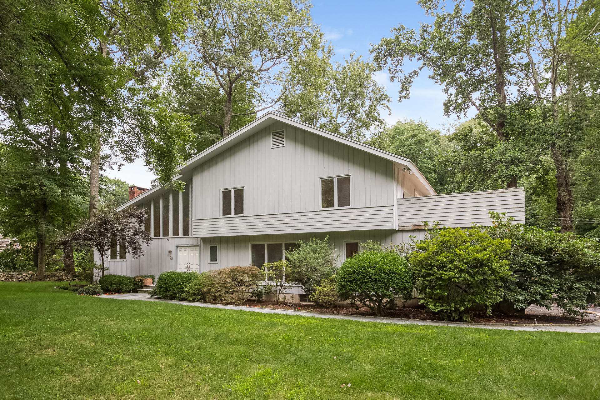 92 Rolling Ridge Road Stamford, CT 06903 - Photo 1 of 34 a view of a yard in front of house