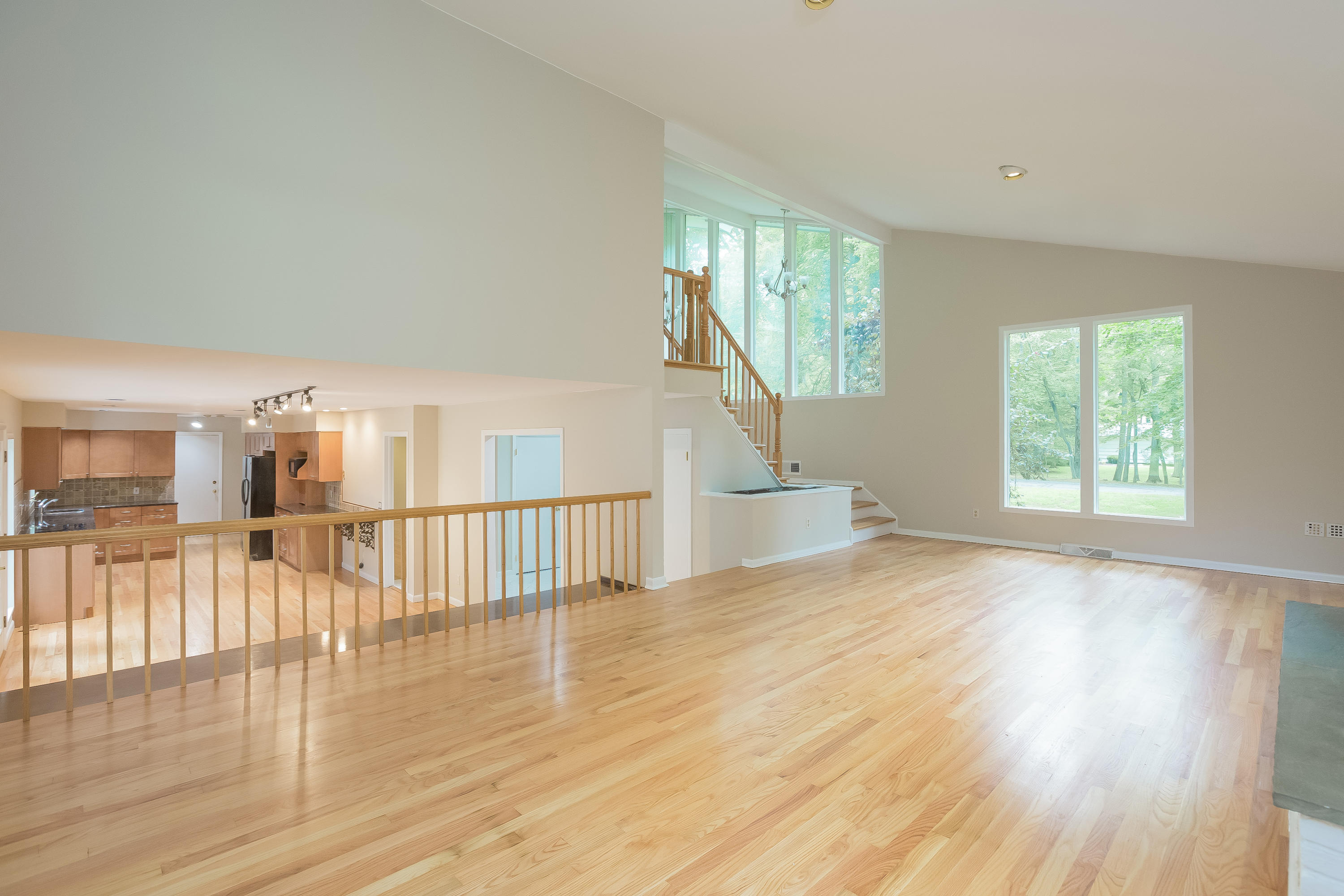 92 Rolling Ridge Road Stamford, CT 06903 - Photo 16 of 34 a view of empty room with wooden floor and fan