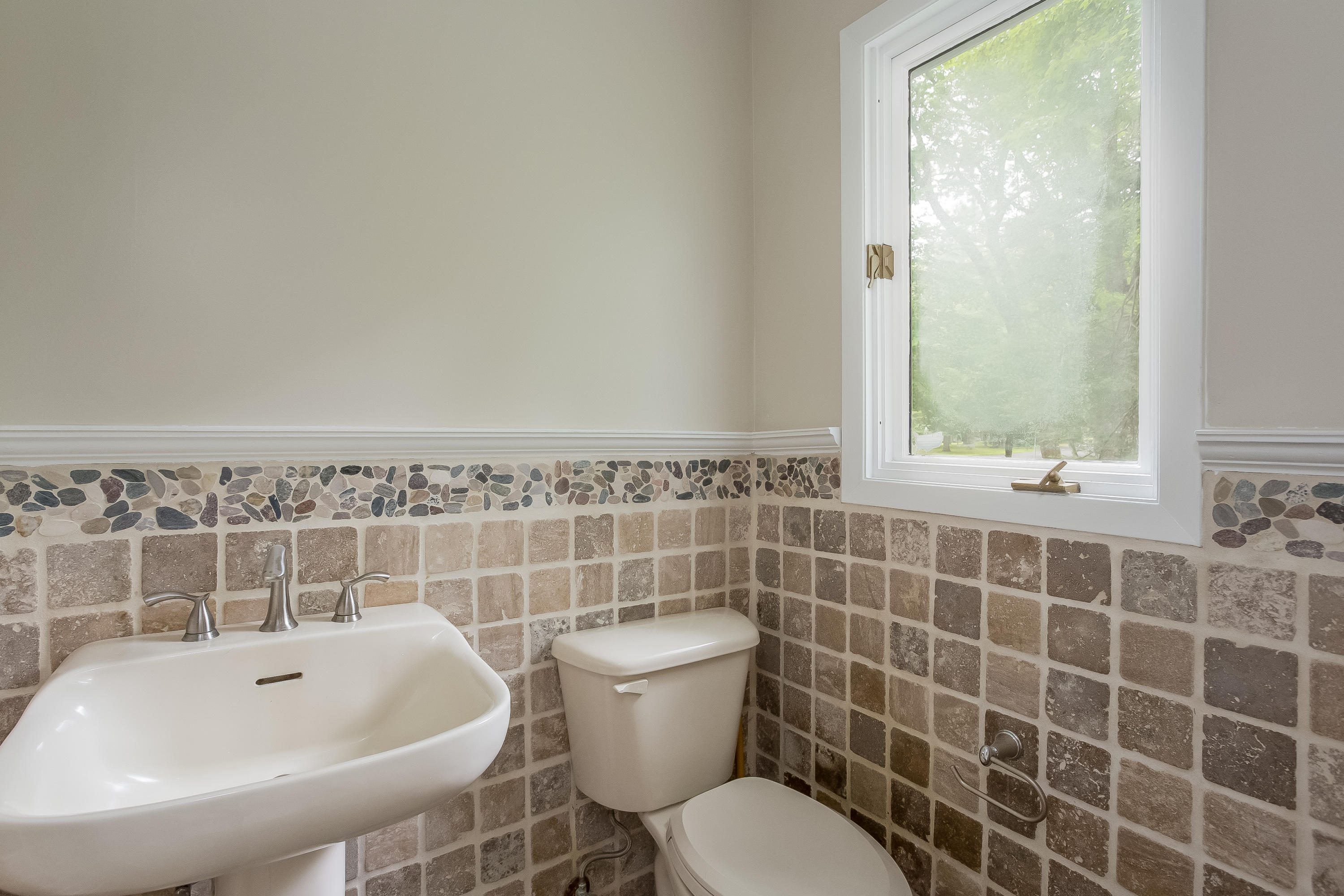 92 Rolling Ridge Road Stamford, CT 06903 - Photo 18 of 34 a bathroom with a sink a toilet and mirror