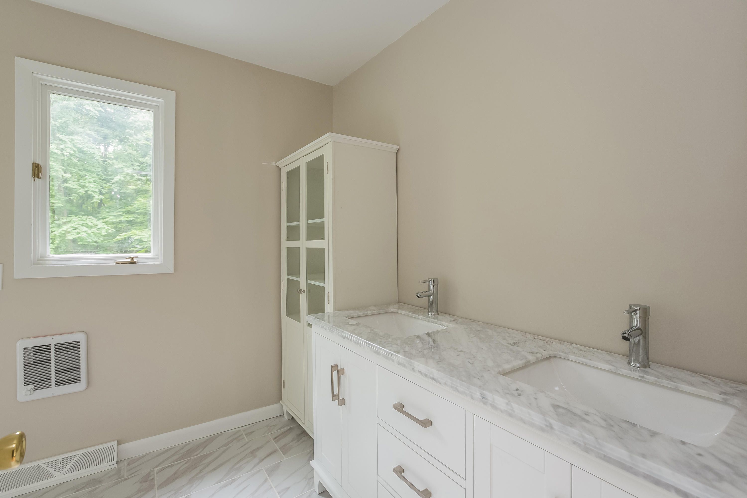 92 Rolling Ridge Road Stamford, CT 06903 - Photo 21 of 34 a bathroom with a granite countertop sink and vanity