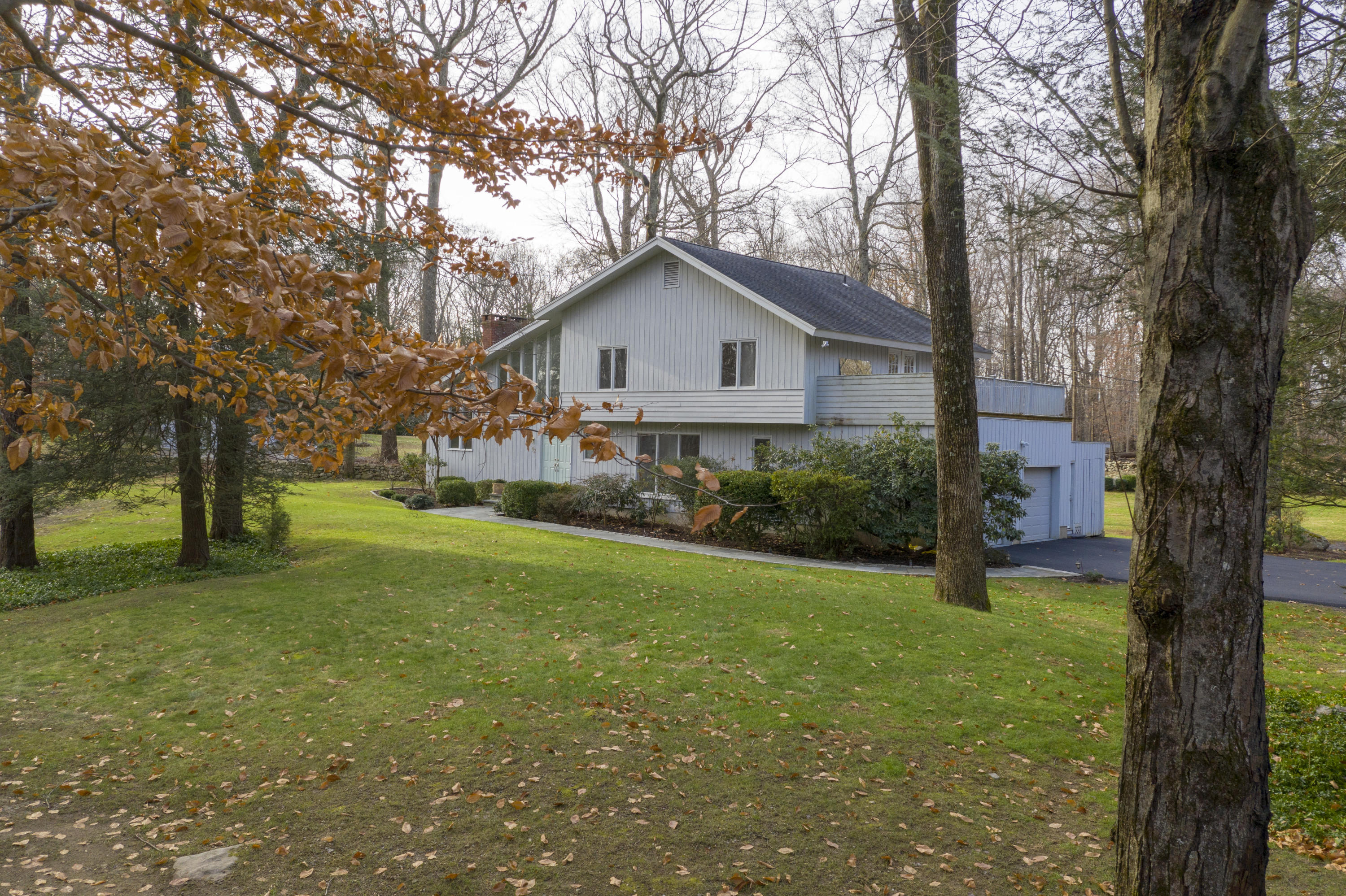 92 Rolling Ridge Road Stamford, CT 06903 - Photo 3 of 34 a house view with a outdoor space
