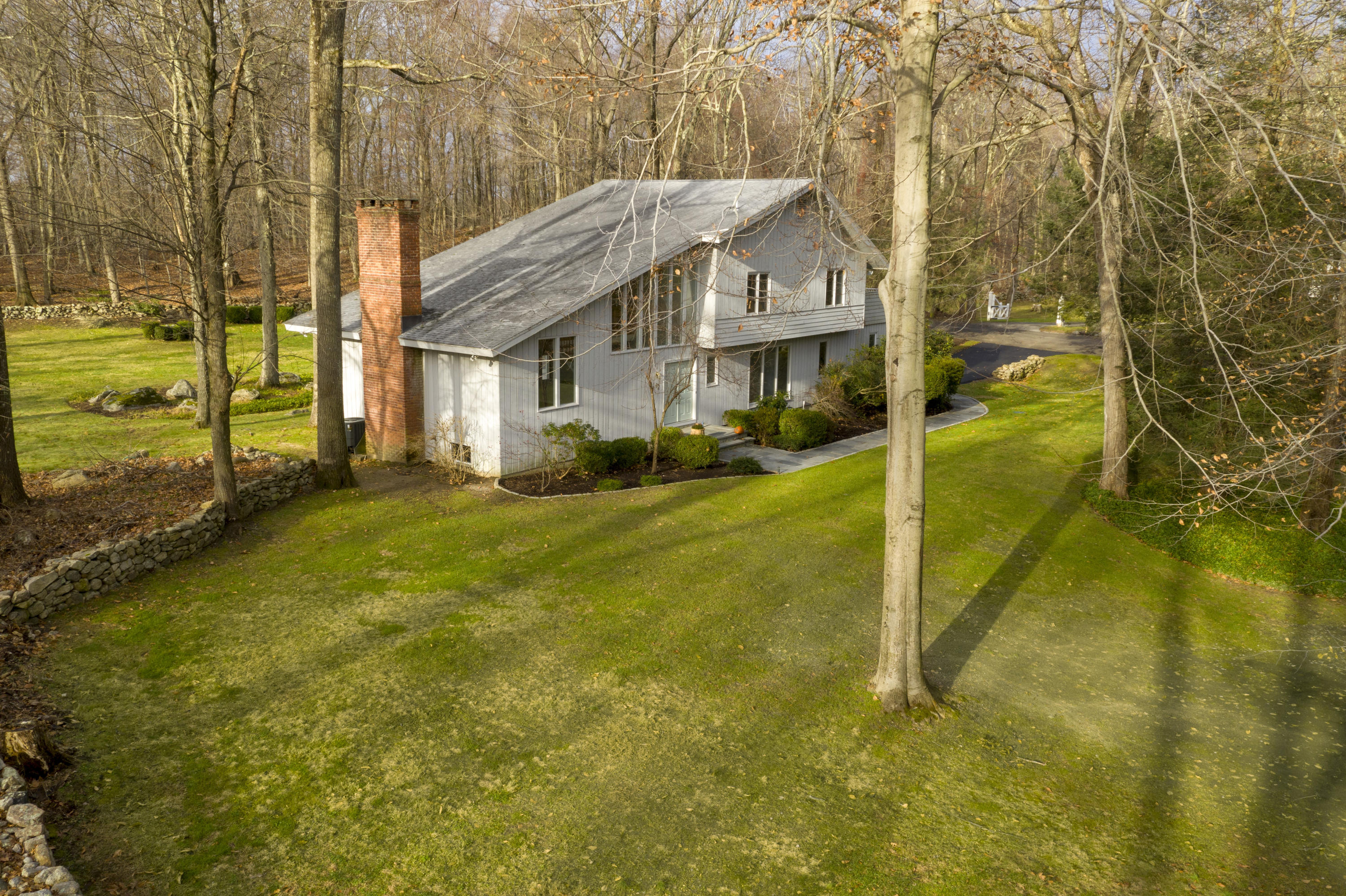 92 Rolling Ridge Road Stamford, CT 06903 - Photo 4 of 34 a view of residential houses with yard and swimming pool