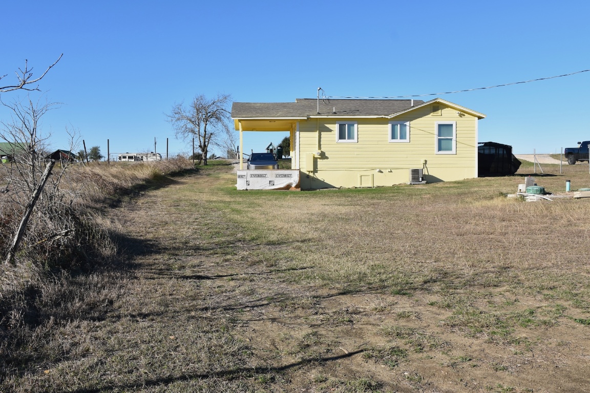 3775 County Road 463 Elgin, TX 78621 - Photo 27 of 28 Rear view of house