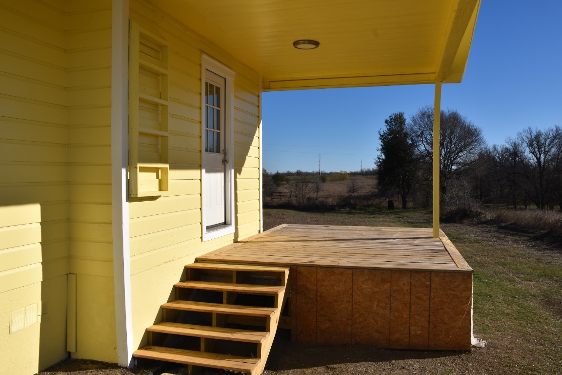 3775 County Road 463 Elgin, TX 78621 - Photo 5 of 28 View of yard with covered porch