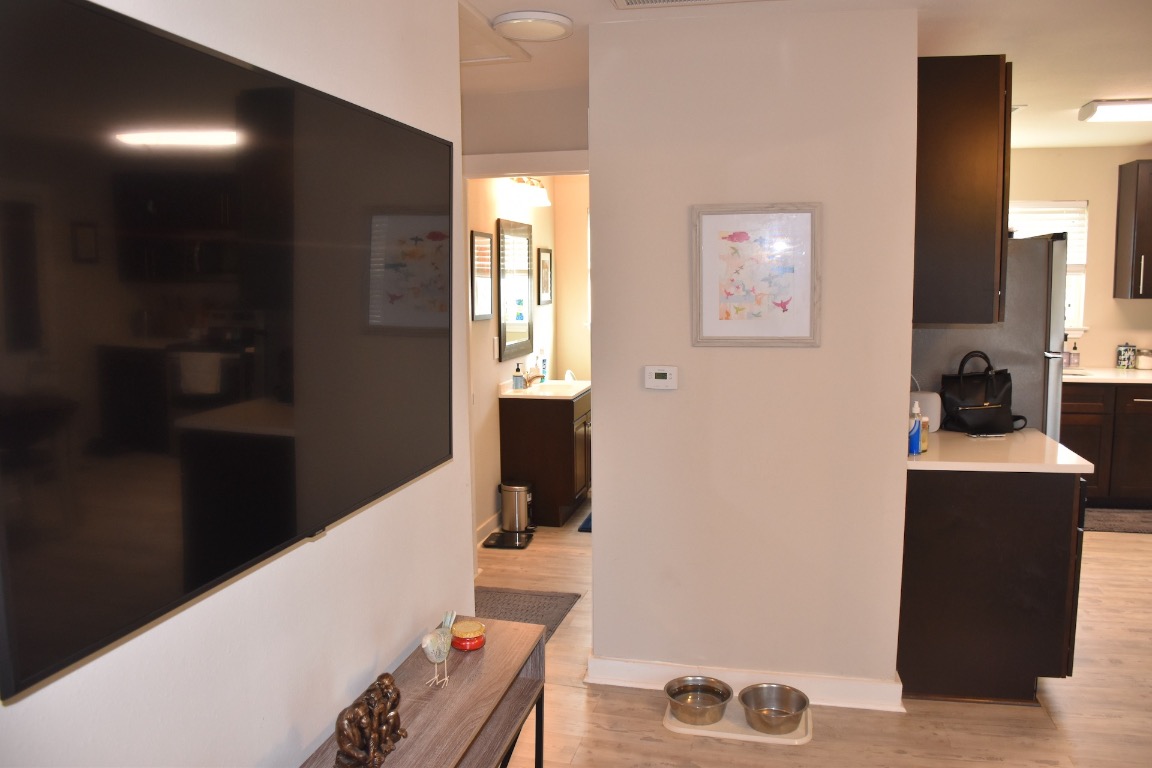 3775 County Road 463 Elgin, TX 78621 - Photo 7 of 28 Corridor featuring light wood finished floors and baseboards