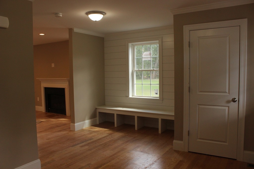 179 Groton Road Chelmsford, MA 01863 - Photo 6 of 19 an empty room with wooden floor and windows