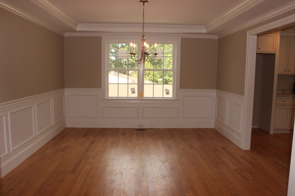 179 Groton Road Chelmsford, MA 01863 - Photo 7 of 19 an empty room with wooden floor and windows