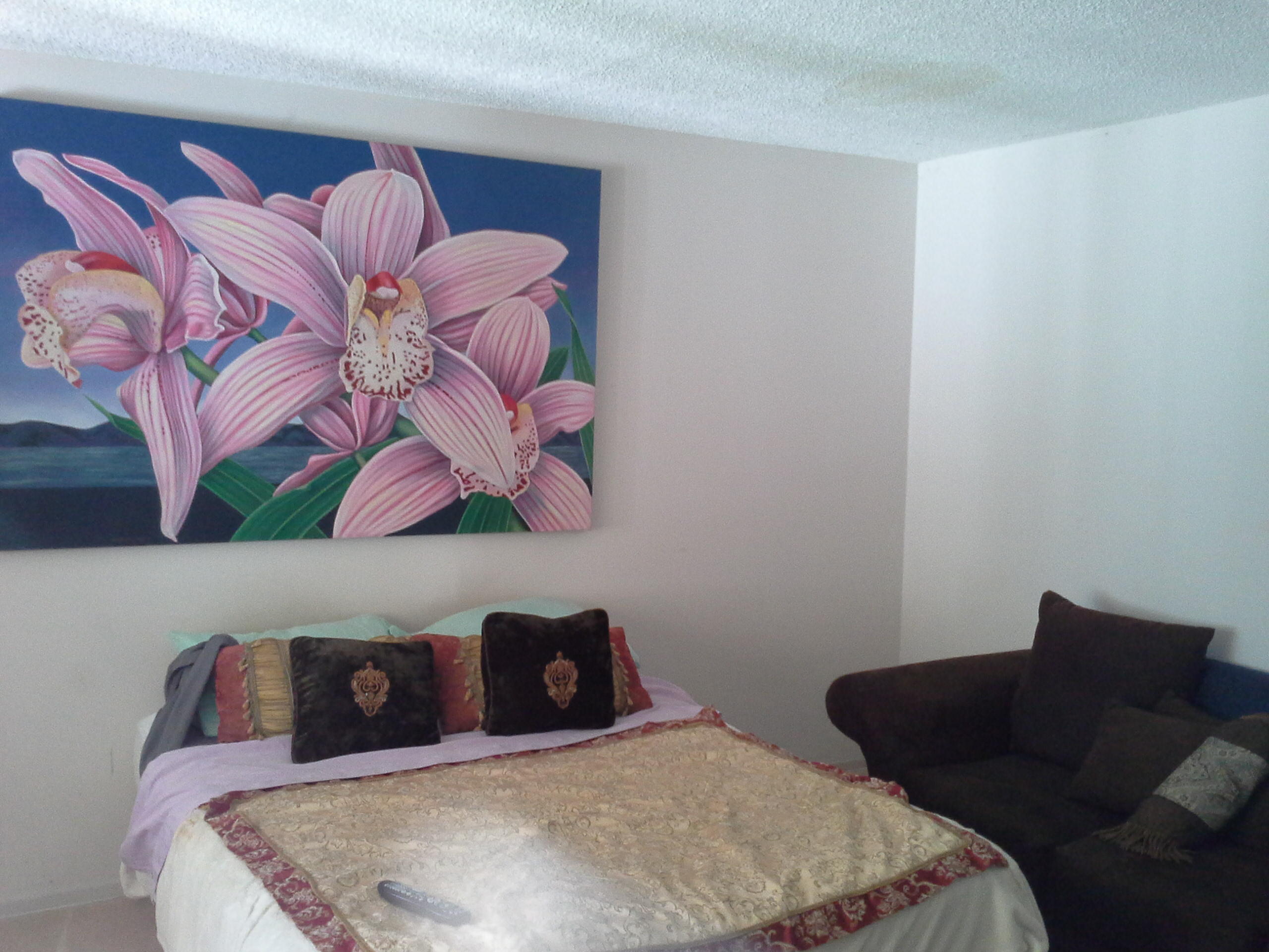817 Cieneguitas Road Santa Barbara, CA 93110 - Photo 9 of 12 a bedroom with a bed and a couch