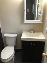 a bathroom with a sink and a toilet