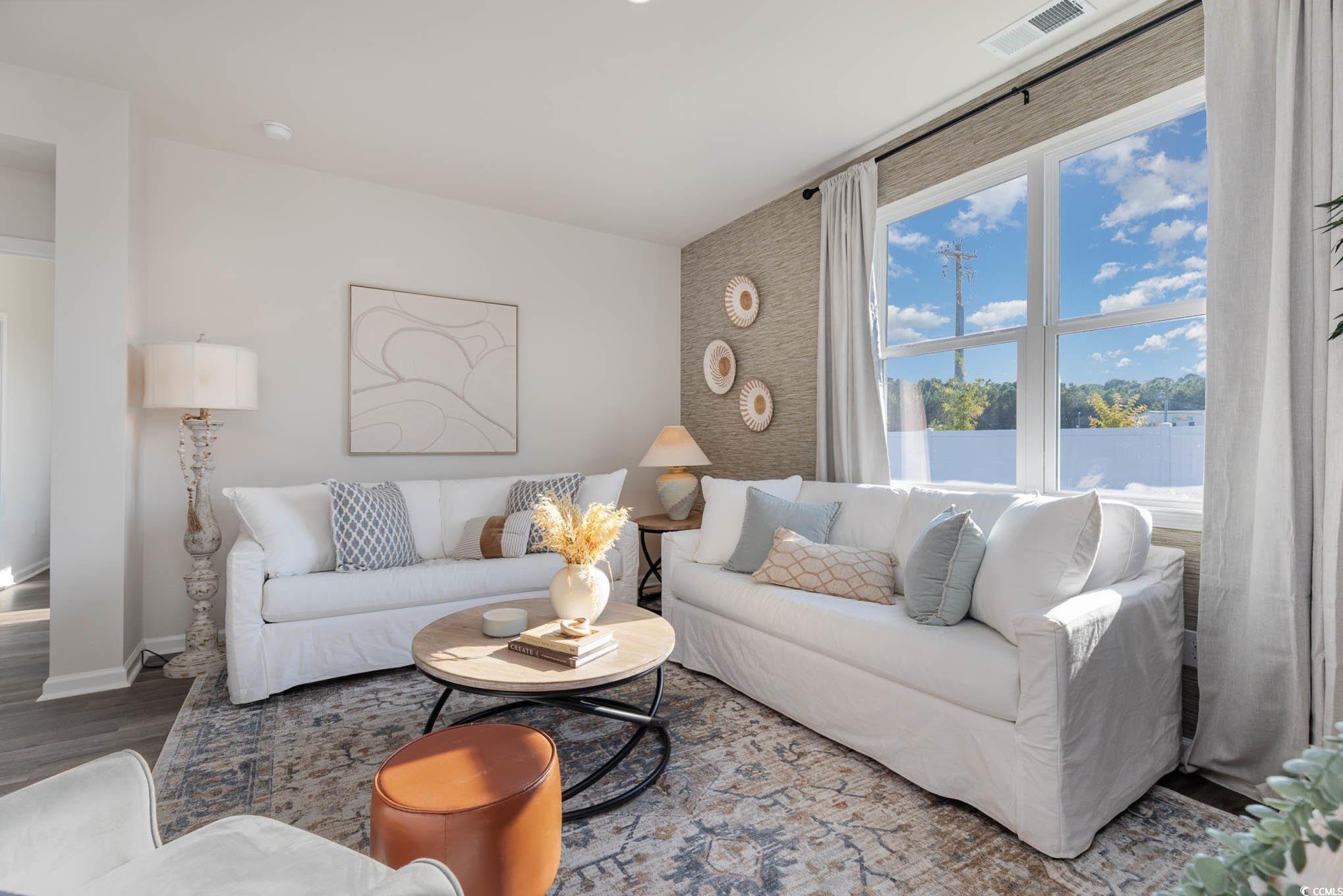 573 Duvall Street Longs, SC 29568 - Photo 8 of 14 Living room featuring hardwood / wood-style floors