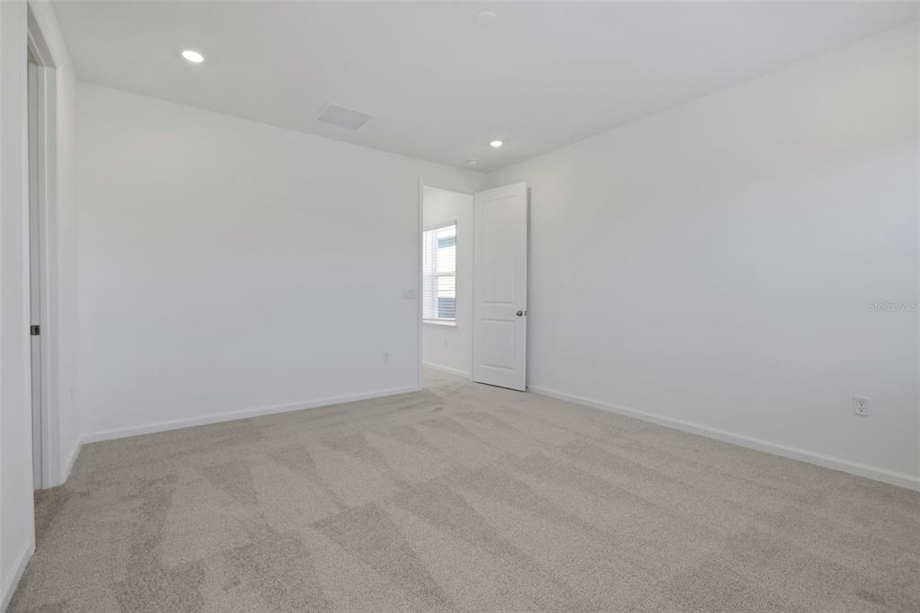 13037 Serene Glade Road Winter Garden, FL 34787 - Photo 25 of 62 a view of an empty room