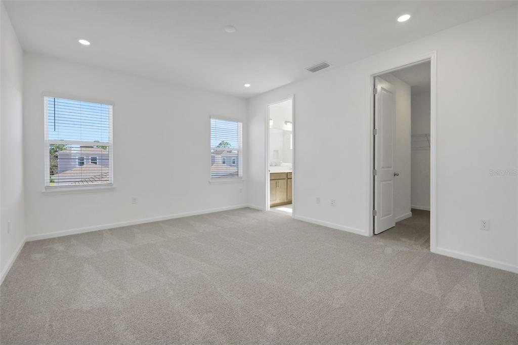 13037 Serene Glade Road Winter Garden, FL 34787 - Photo 27 of 62 a view of an empty room with a window