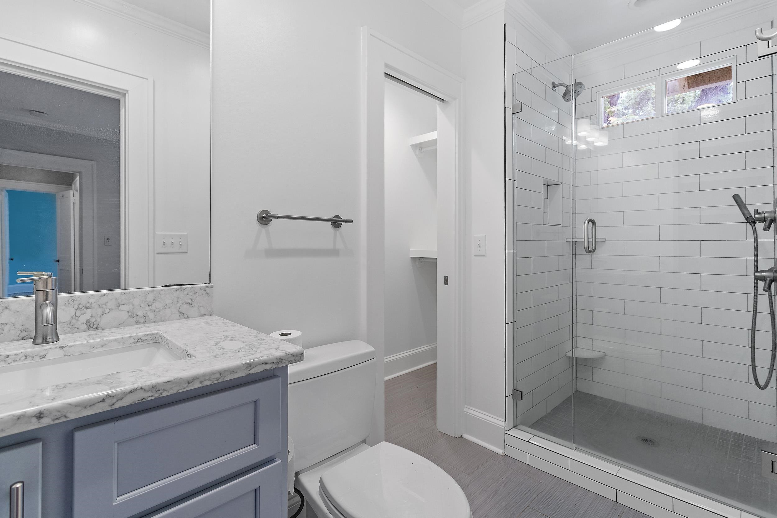 527 Euclid Street Raleigh, NC 27604 - Photo 14 of 27 a bathroom with a granite countertop sink toilet and shower