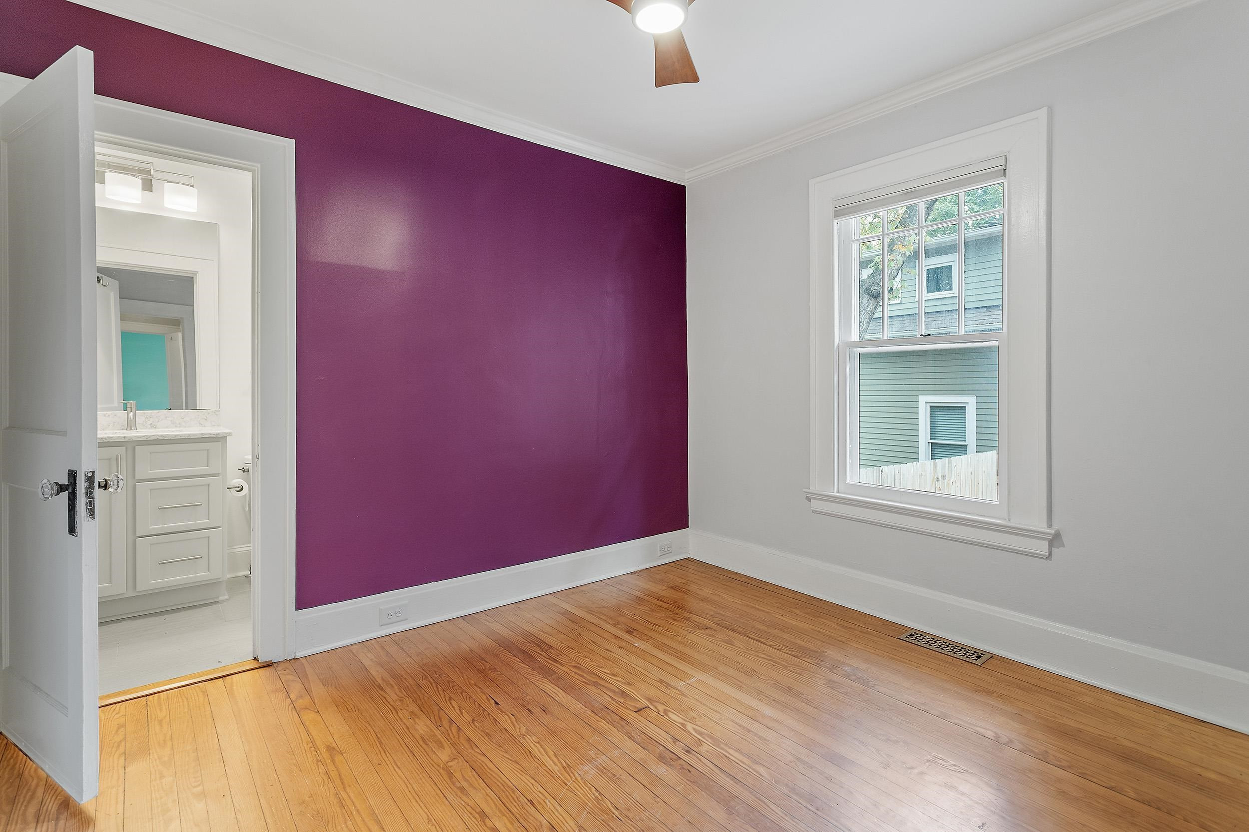 527 Euclid Street Raleigh, NC 27604 - Photo 16 of 27 an empty room with windows
