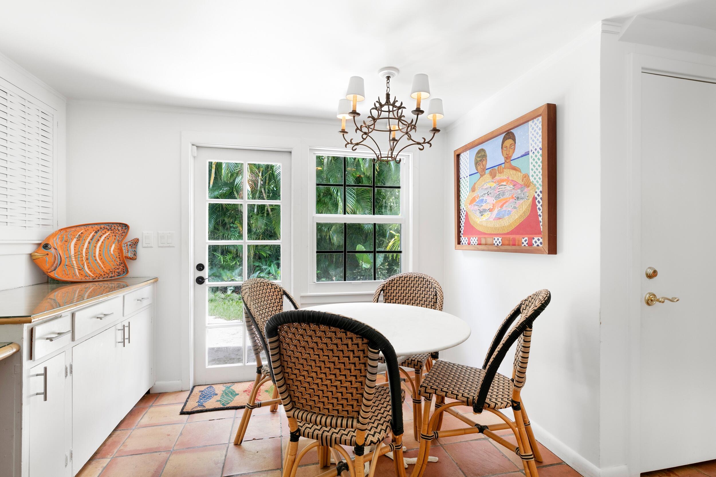 285 Orange Grove Road Palm Beach, FL 33480 - Photo 13 of 29 a dining room with furniture and window
