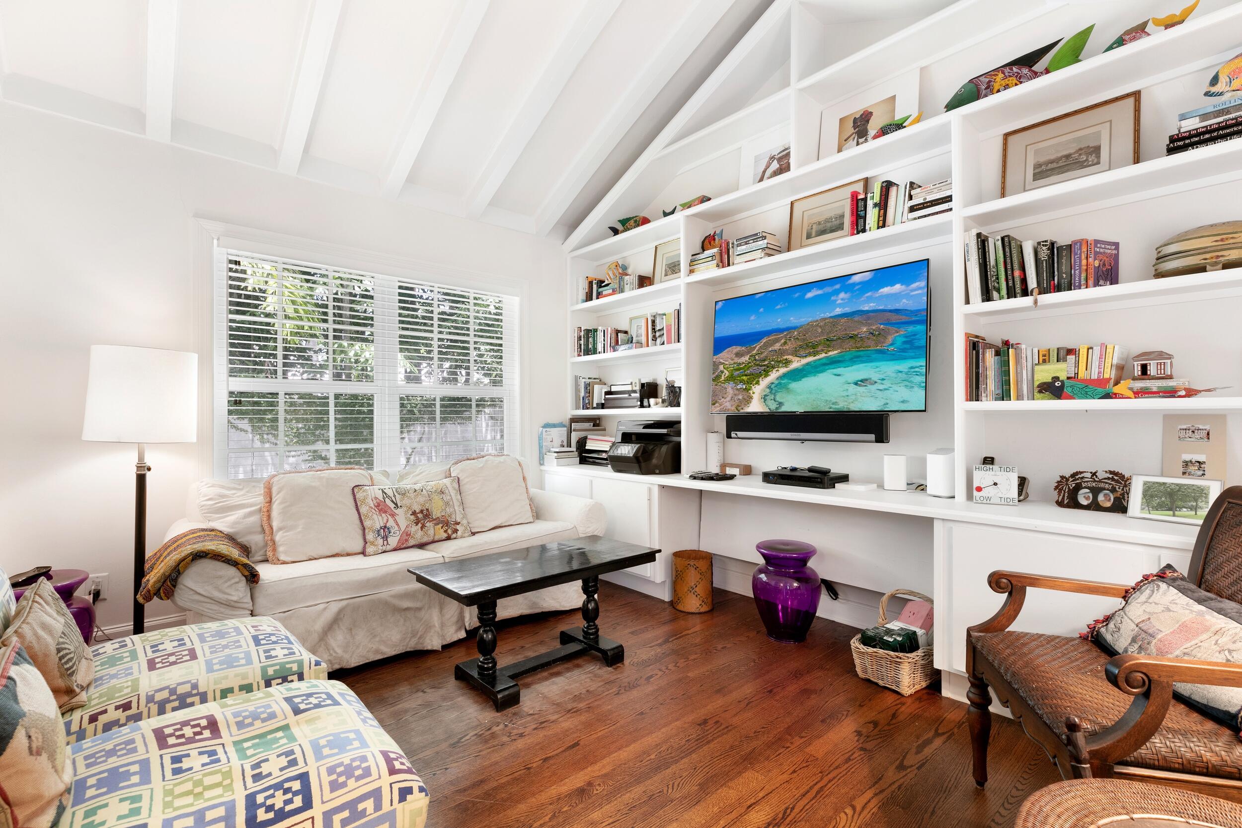 285 Orange Grove Road Palm Beach, FL 33480 - Photo 18 of 29 a living room with furniture and a flat screen tv