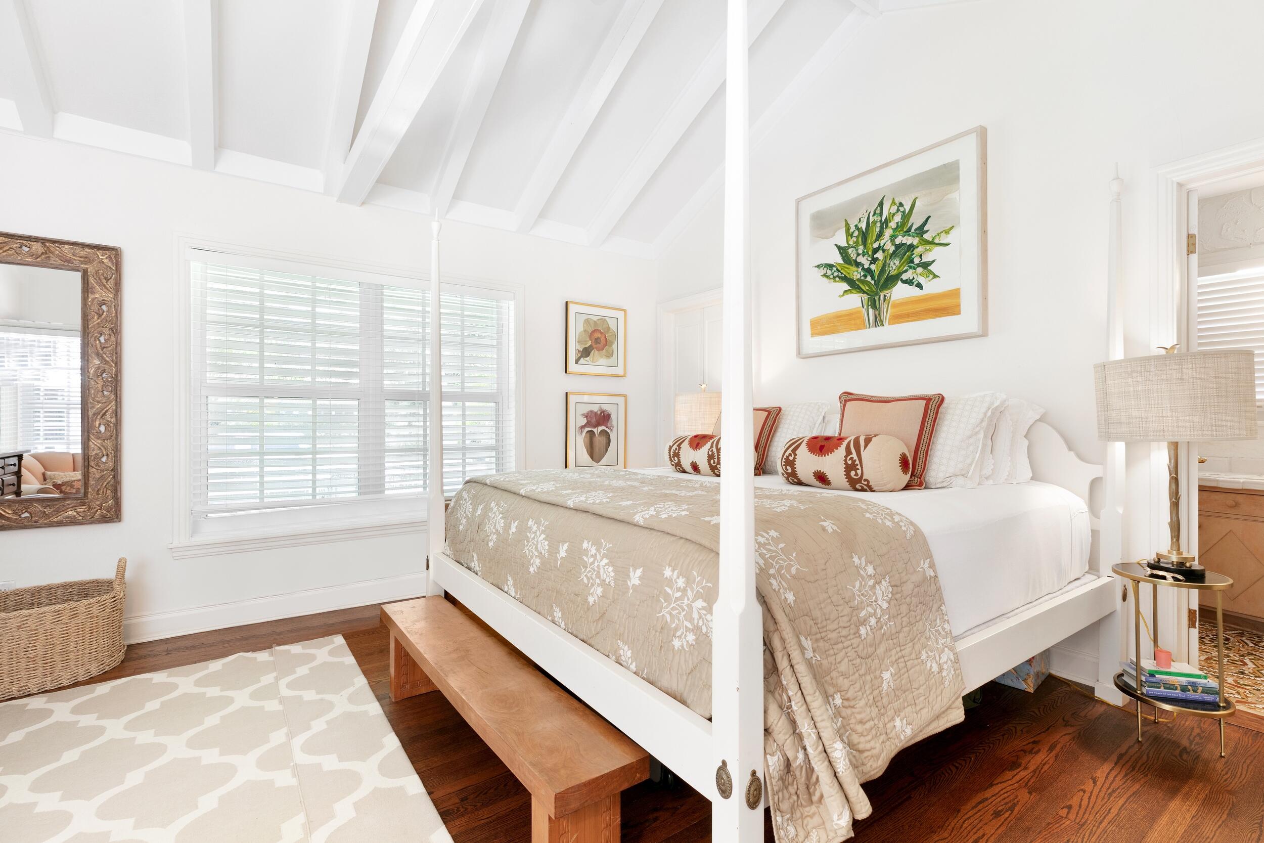 285 Orange Grove Road Palm Beach, FL 33480 - Photo 22 of 29 a bedroom with a bed and a large window