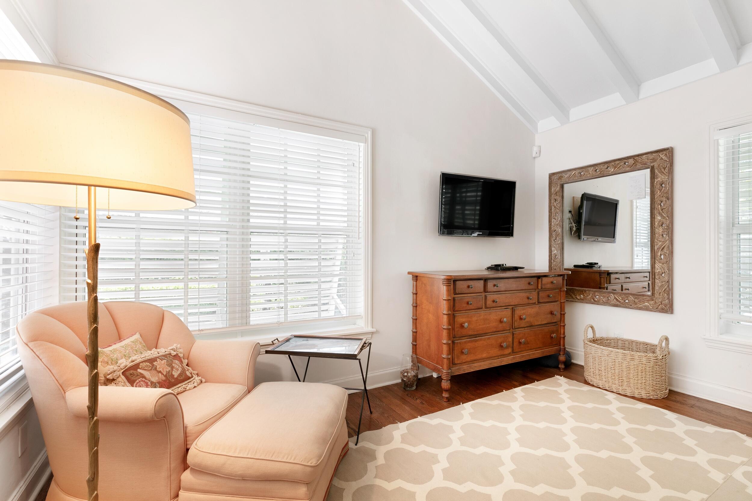 285 Orange Grove Road Palm Beach, FL 33480 - Photo 23 of 29 a living room with furniture and a flat screen tv